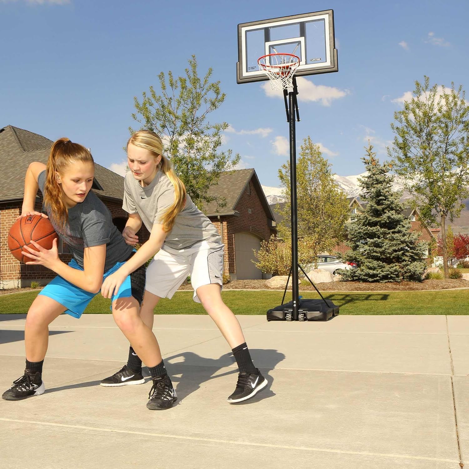 Lifetime Adjustable Portable Basketball Hoop, 50-Inch Backboard, 8-10 ft Height Foot Adjustment