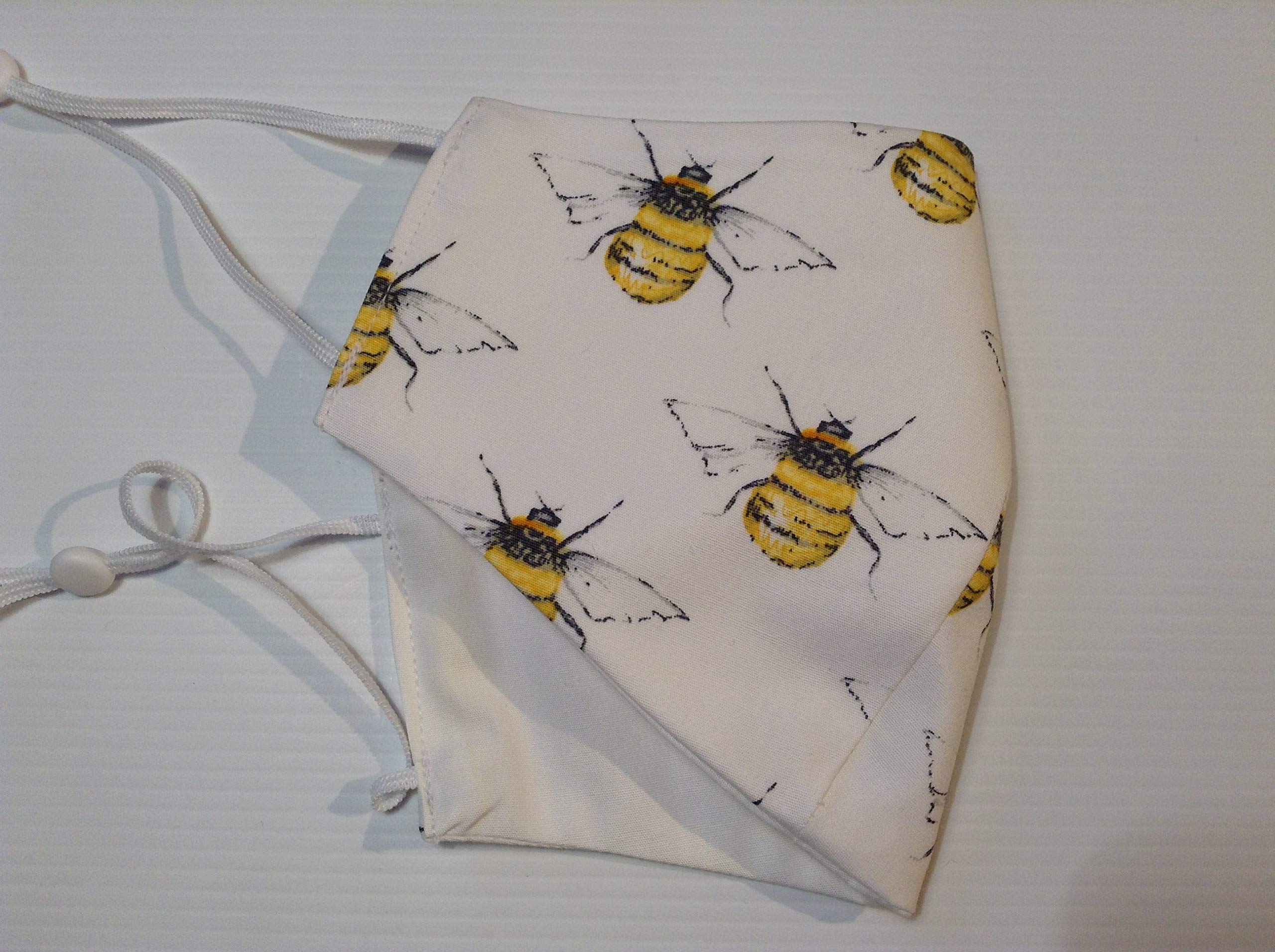 Handmade in UK 100% Cotton 3 layer Face Mask, washable, eco friendly and reuseable bee pattern on cream
