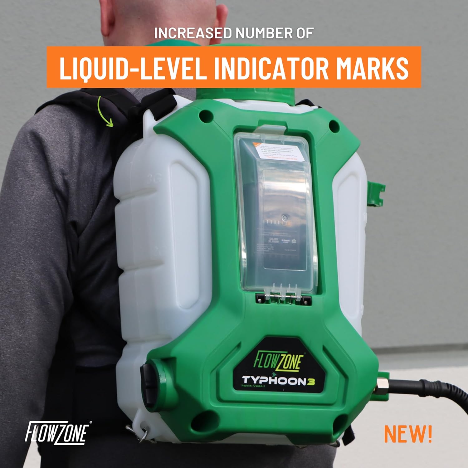 Close-up of the liquid-level indicator marks on the side of the FlowZone Typhoon 3 sprayer tank.
