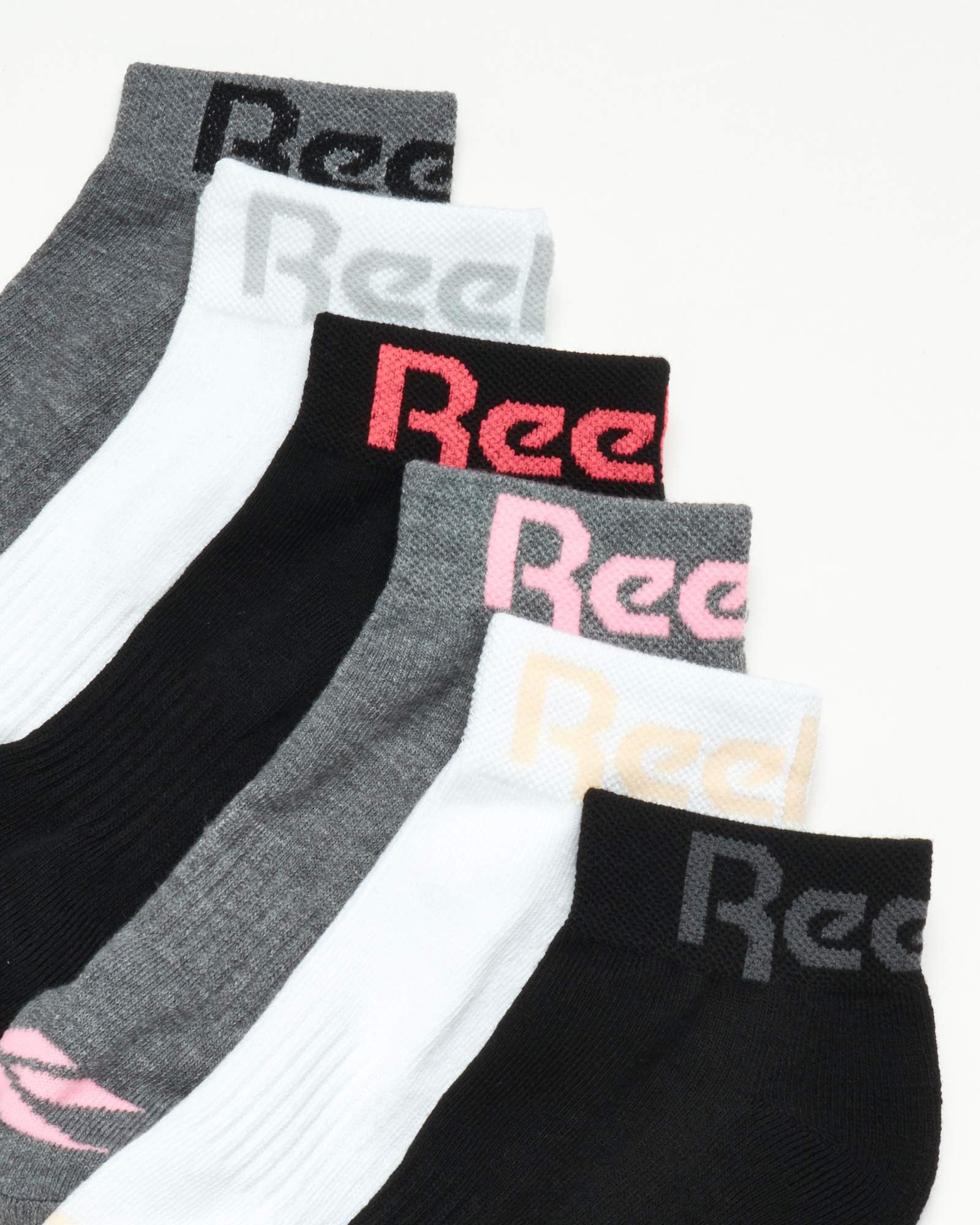 Reebok Calcetines de cuarto para mujer, paquete de 12 calcetines de tobillo con soporte de arco de rendimiento, calcetines deportivos acolchados para mujer (talla 4-10)