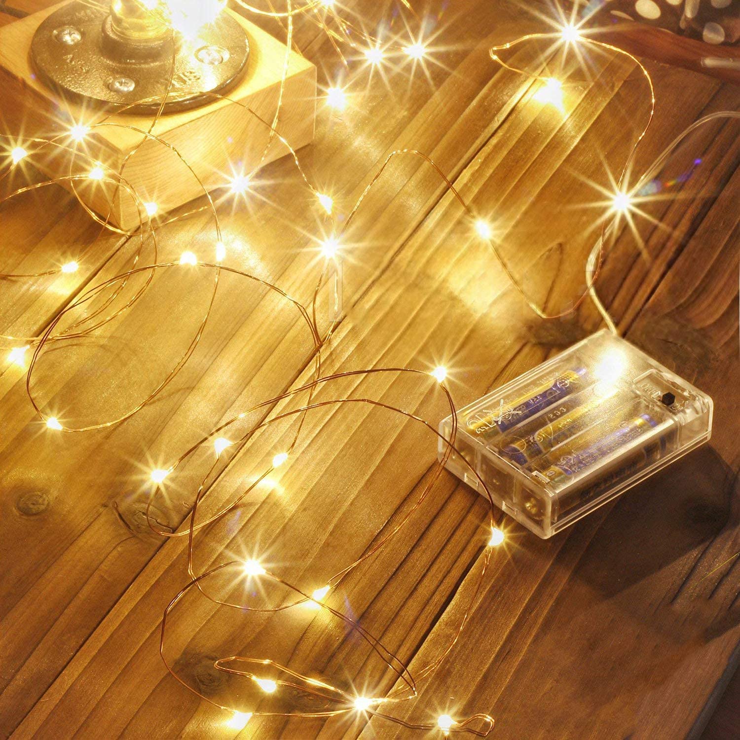 LTETTES 5 Meter 50 Led Battery Powered Waterproof Copper Wire Warm White Led Fairy String Lights for Home Bedroom Decorations Lights. Wedding, Diwali, Christmas Tree Lights