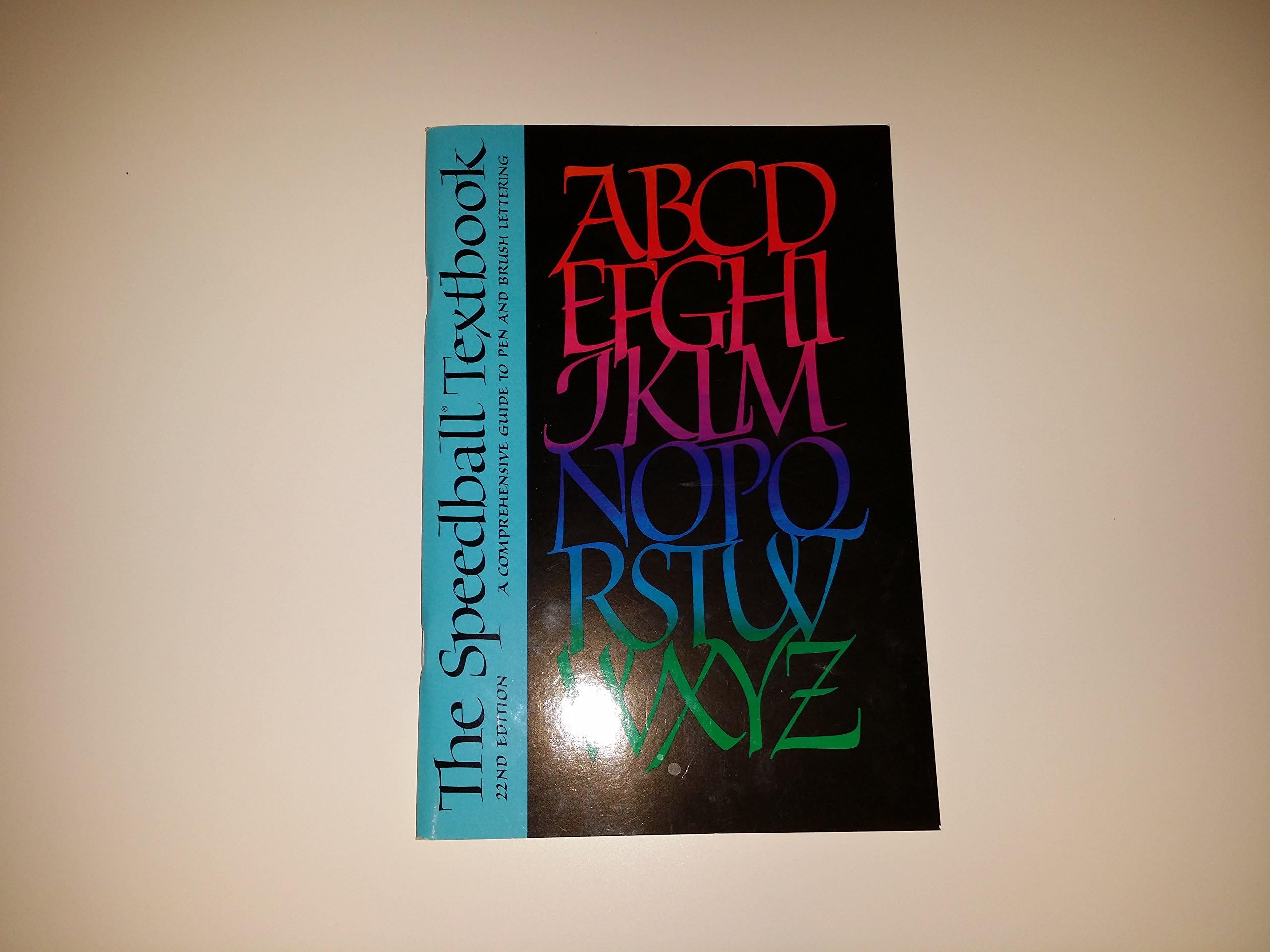 The Speedball Textbook: A Comprehensive Guide to Pen and Brush Lettering Paperback – January 1, 1991