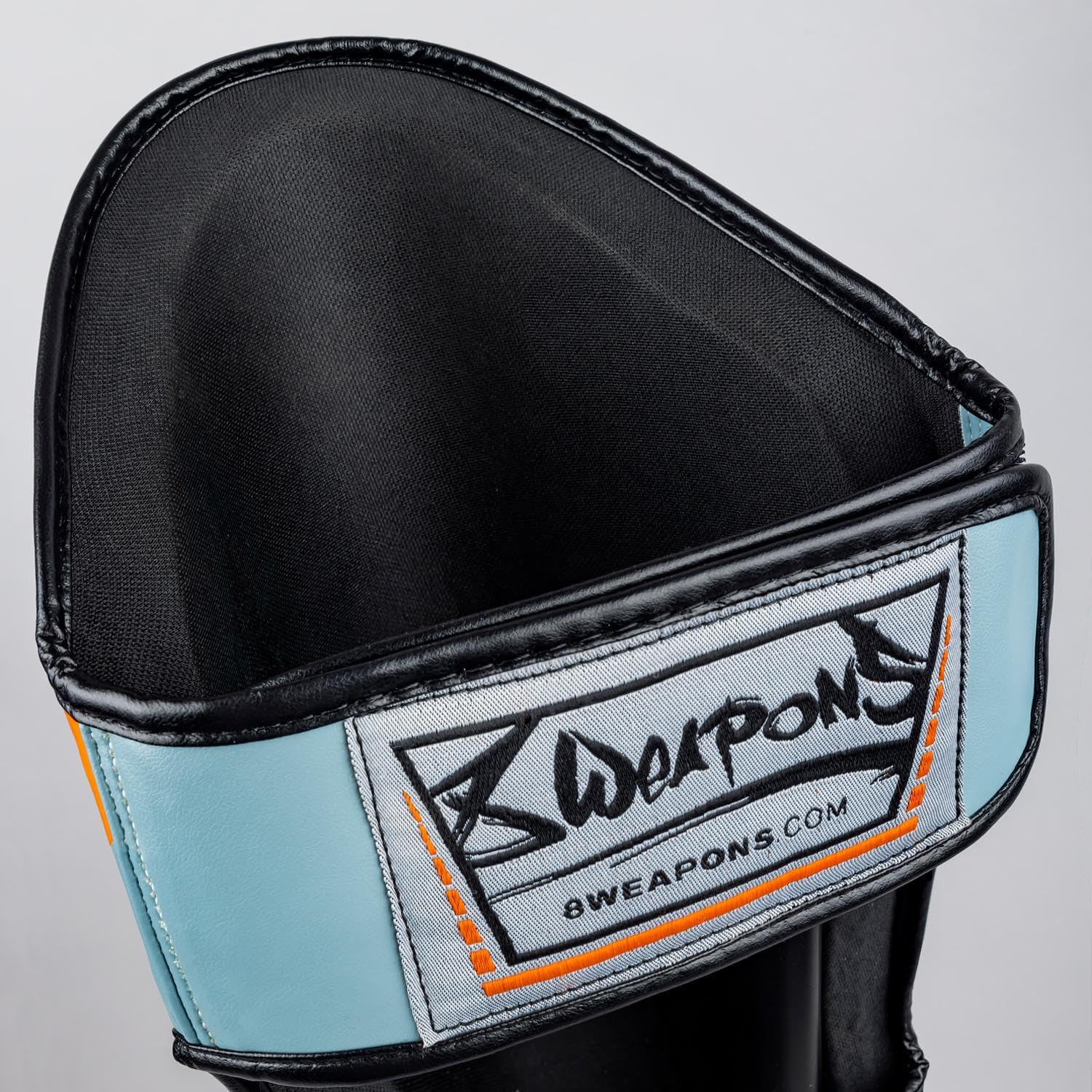 8 WEAPONS Espinilleras Shift, color gris hielo naranja, entrenamiento y competición, piel sintética de alta calidad y amortiguación perfecta, Muay Thai, K1, MMA, karate y kickboxing