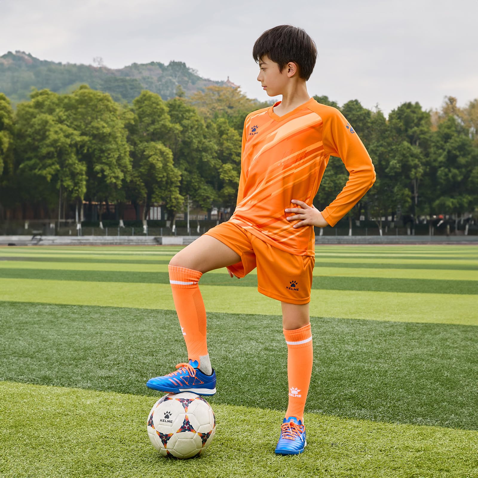 KELME Camiseta de portero acolchada y corta para niños, camiseta de portero, uniforme de entrenamiento de césped de manga larga, juego de fútbol sal, juego de ropa naranja para niños 10
