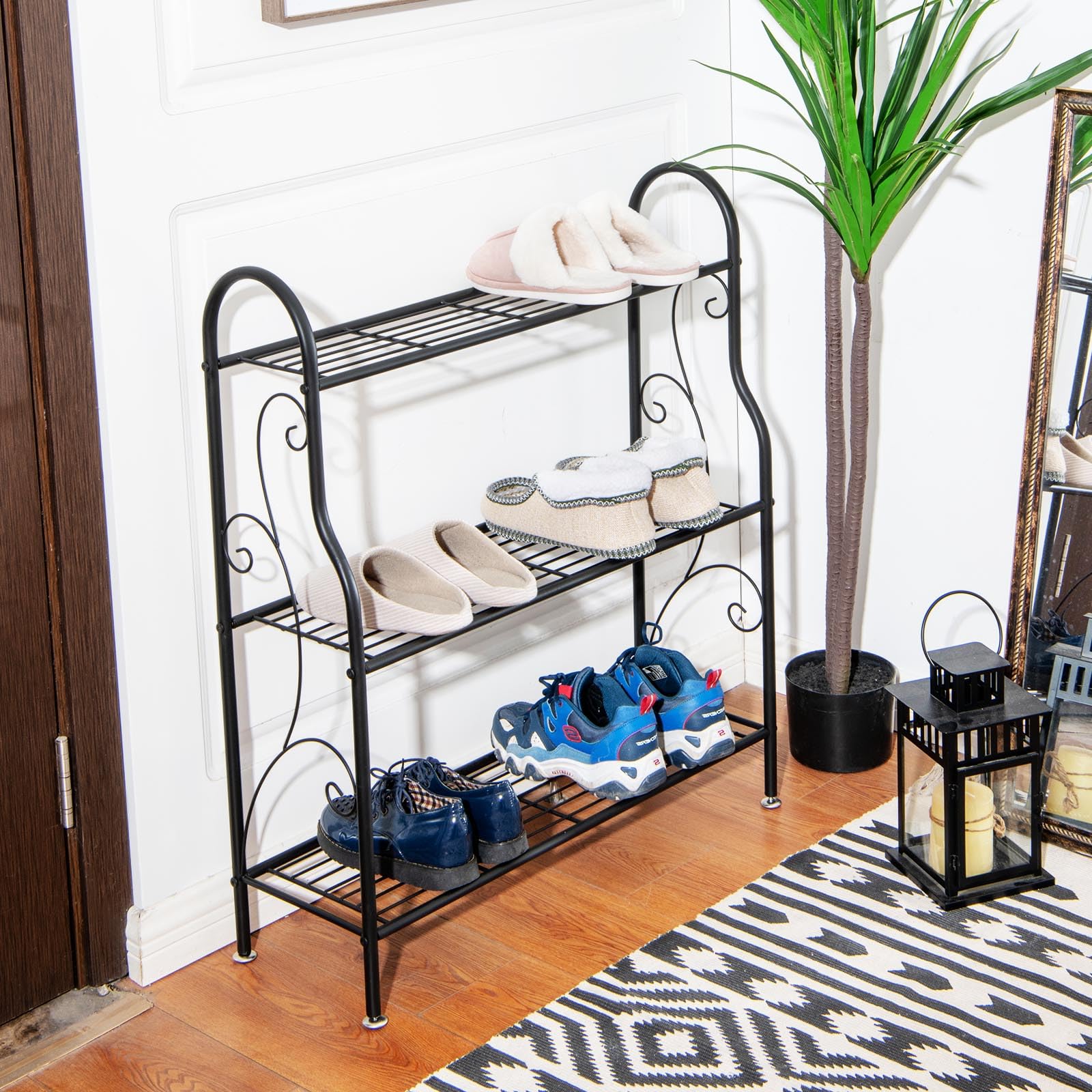 HOMASIS Support de plantes intérieur à 3 niveaux, étagère pour plantes en métal, porte-pots avec repose-pieds réglable, étagère multifonction pour balcon, cour, salon, 72 x 25 x 85 cm, noir