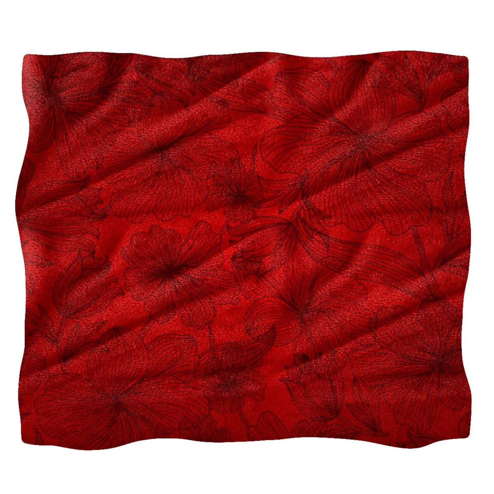 Couverture polaire fleurie rouge foncé pour vos soirées cocooning sur le canapé