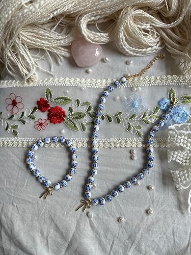 Miniatura 8 de Pulsera con dije de lazo y cuentas para mujer, estilo vintage con flores, hecha a mano, elástica y delicada, ideal como regalo romántico de joyería