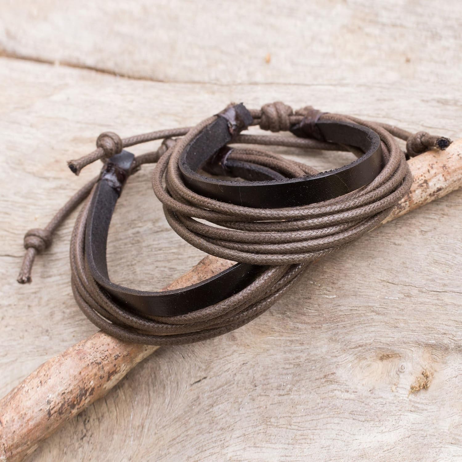 NOVICA Artisan Handmade Men's Leather Wristband Bracelets Black Brown Cotton Pair Thailand [7.75 in min L x 9.75 in max L x 0.6 in W] ' Bold Brown Contrast' Pair