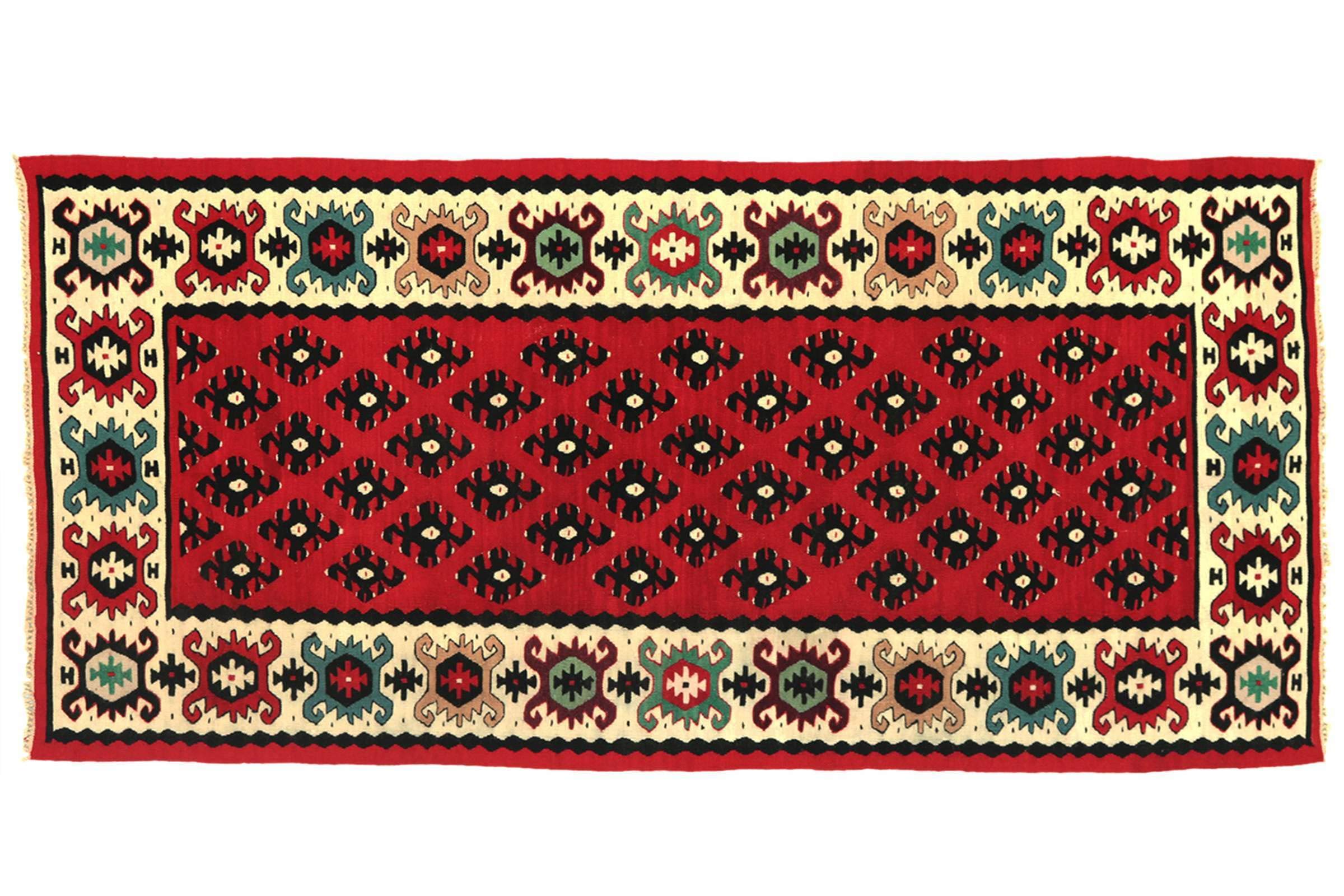 Tapis turc Kelim rouge à motif géométrique pour réchauffer votre salon
