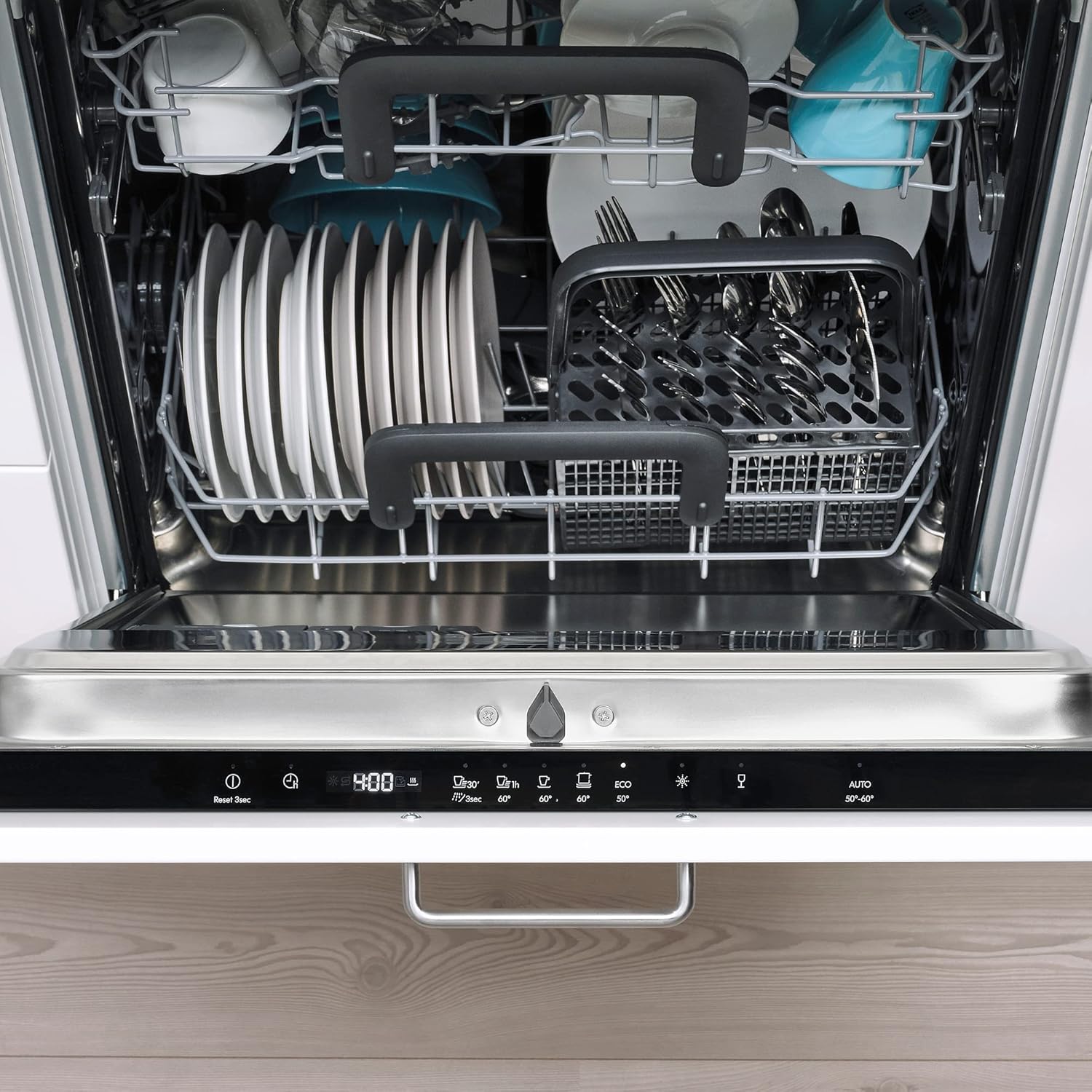 Interior of RENODLAD dishwasher loaded with various dishes and cutlery