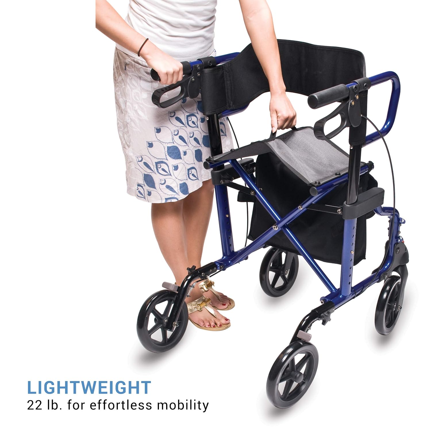 A person demonstrating how to fold the Lumex HybridLX by lifting a strap on the seat.