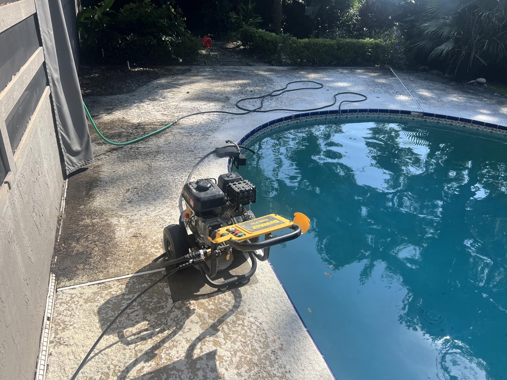 Westinghouse WPX3400 gas pressure washer cleaning a residential surface