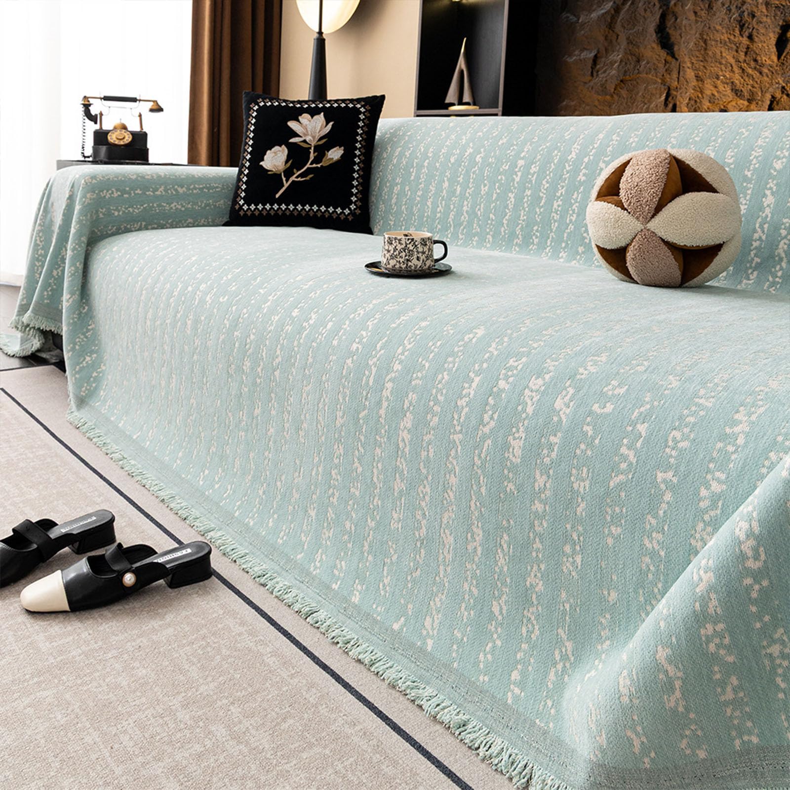 Couverture de canapé utilisable toute l'année pour des soirées cocooning en famille