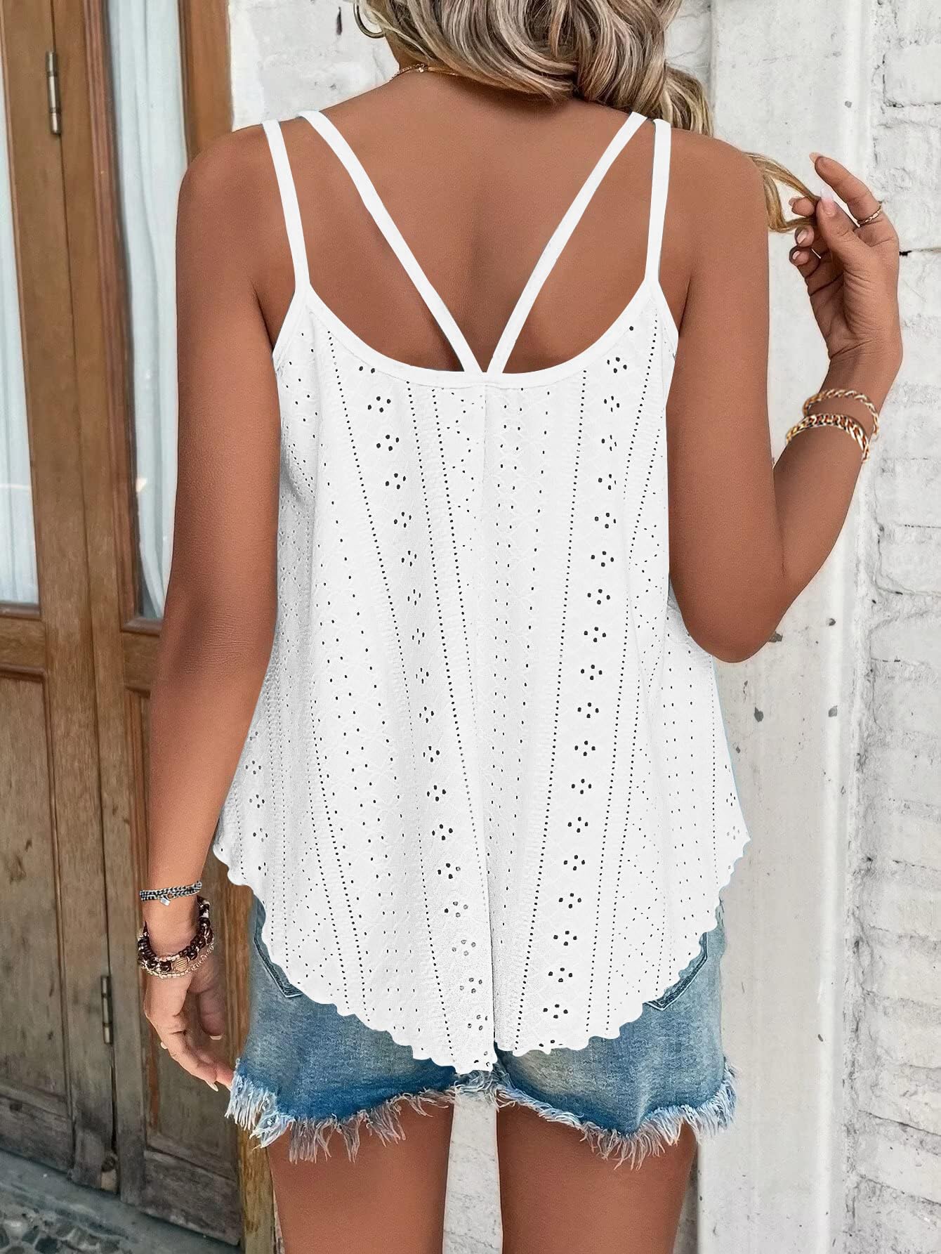 WNEEDU WNEEDU 2026 Womens Summer Tank Tops Eyelet Embroidery Sleeveless Spaghetti Strap Pleated Flowy Scoop Neck Hollow Cami in use