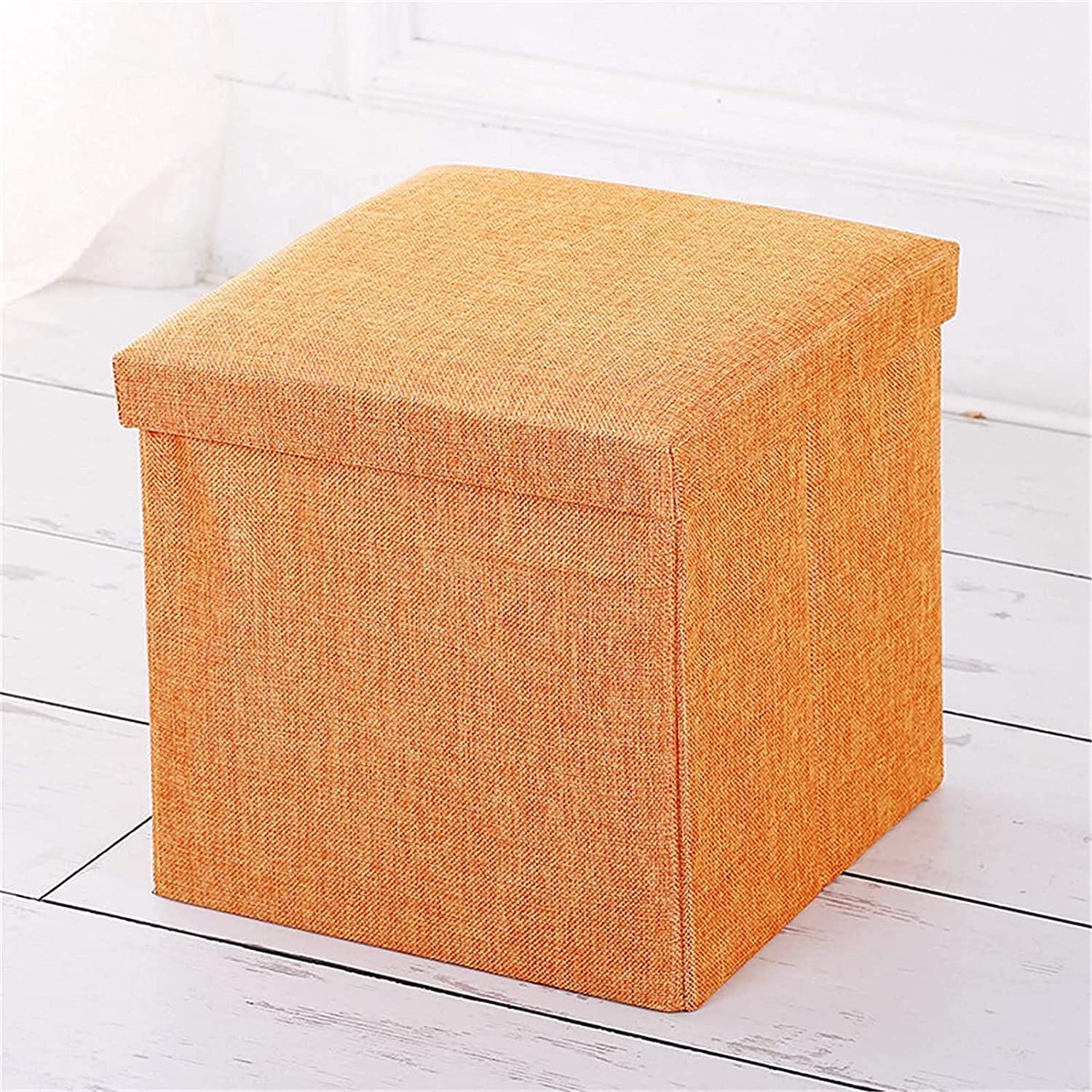 Repose-pieds pouf de rangement idéal pour désencombrer une petite chambre