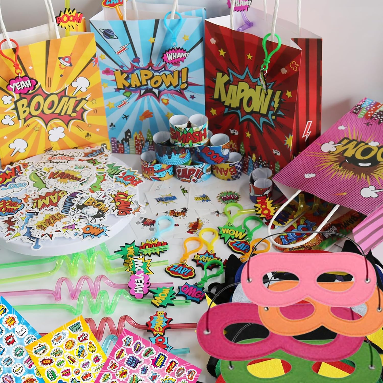 130PCS Hero Themed Party Favors Kit-Birthdays Supplies Includes Reusable Straws,Key Chains,Mask, Stickers,Slap Bracelets,Stickers,Tattoo Sticker,Goodie Bag for Perfect for Hero Party Decorations