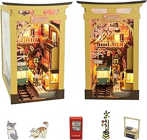 DIY Book Nook Kit - Bookshelf Insert Decor - Featured Sewing Book Nook kit example showing detailed miniature house construction with LED lighting and accessories