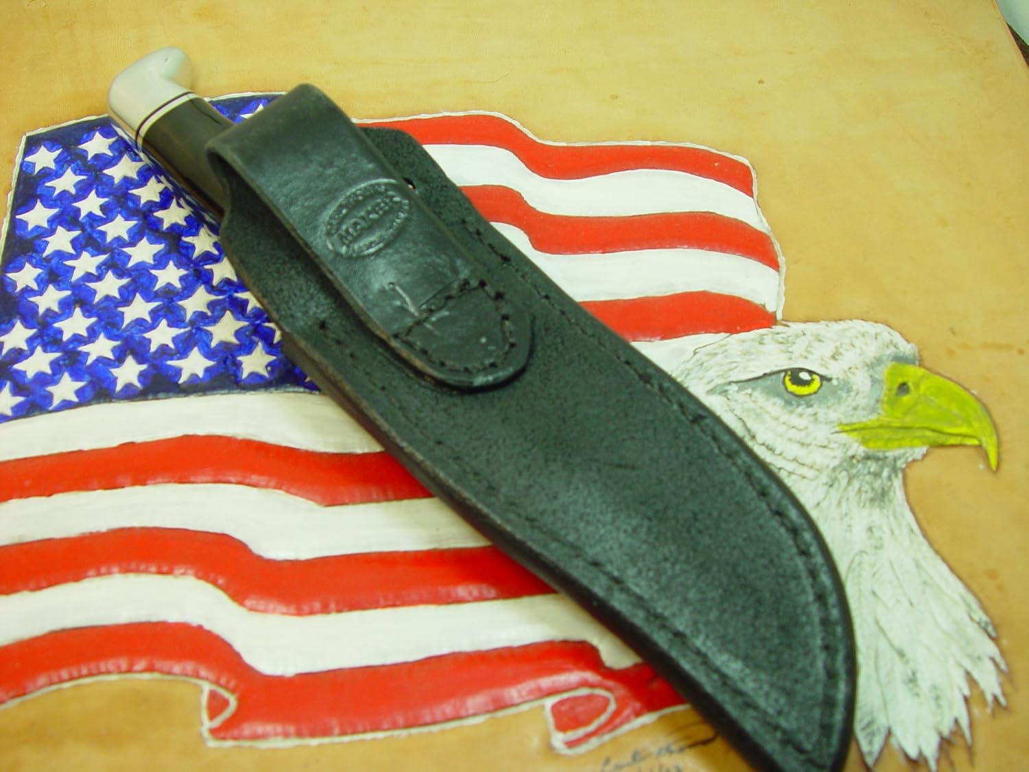 Buck 119 Leather Knife Sheath black (RIGHT-HAND vertical) Hand-tooled with Oak leaves and Acorns. The sheath is made for a buck 119 knife. Sheath ONLY!!
