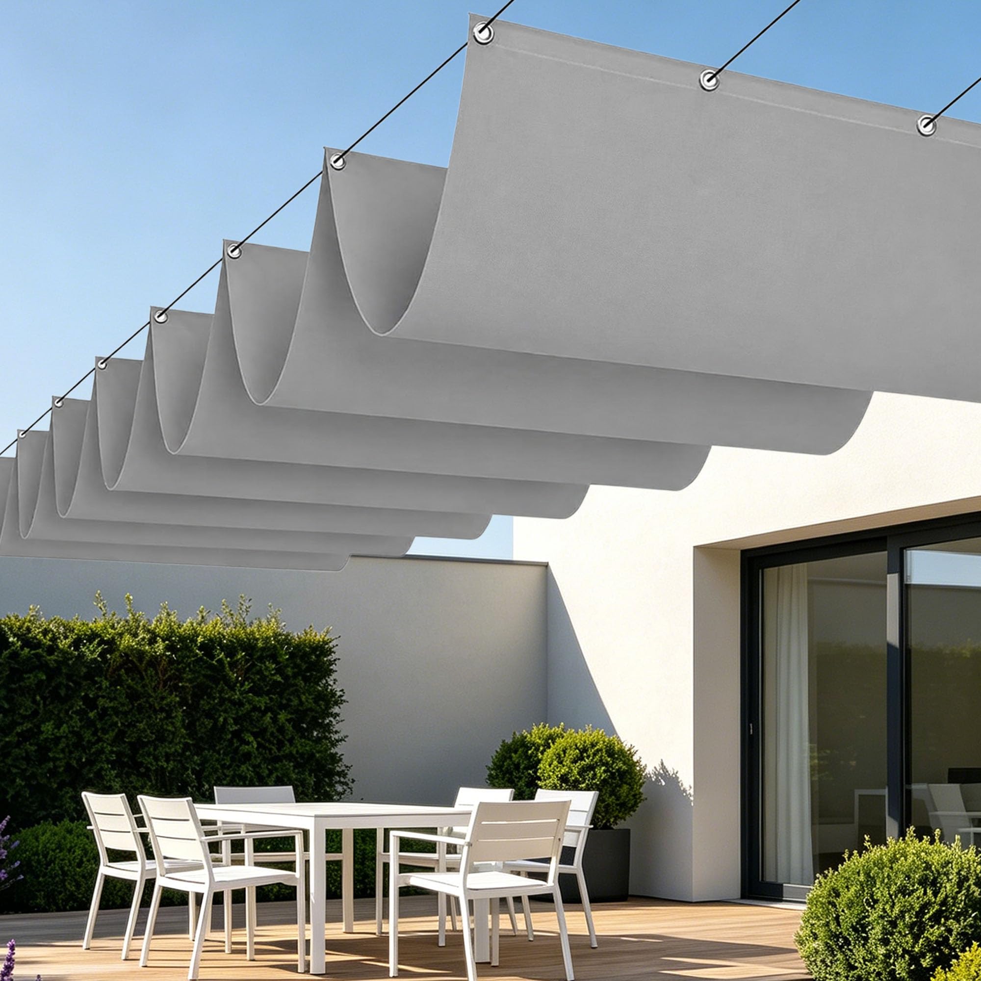 Voile d'ombrage vague rétractable pour bloquer la chaleur du balcon en été