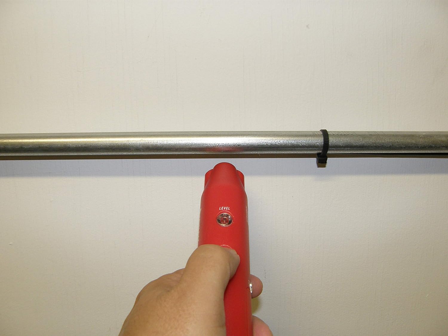 Triplett Hound HotWire tracing a wire inside a metal conduit