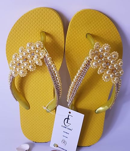 yellow daisy flip flops