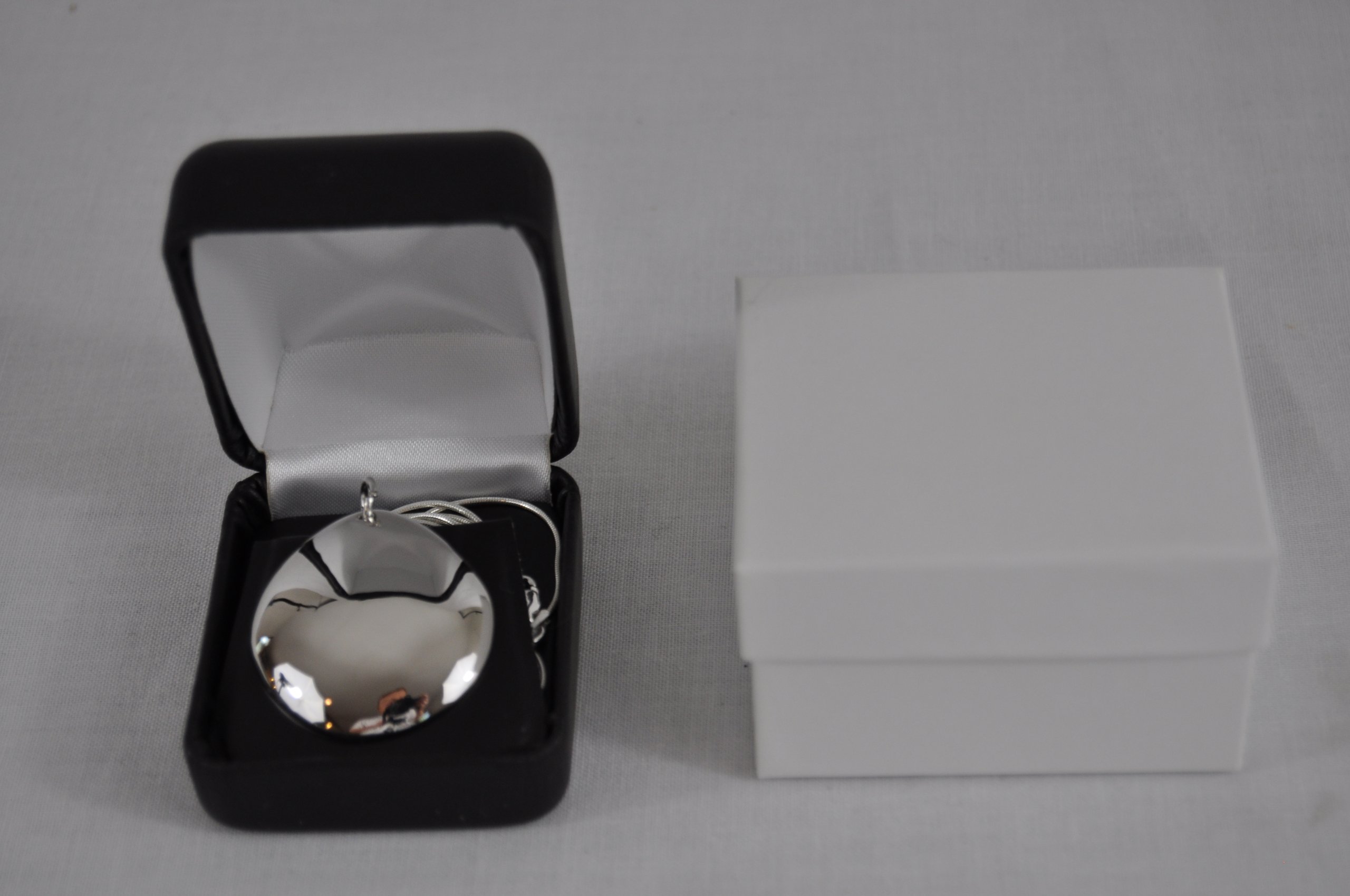 New Clarus Q-link Polished Silver Pebble Pendant Qlink