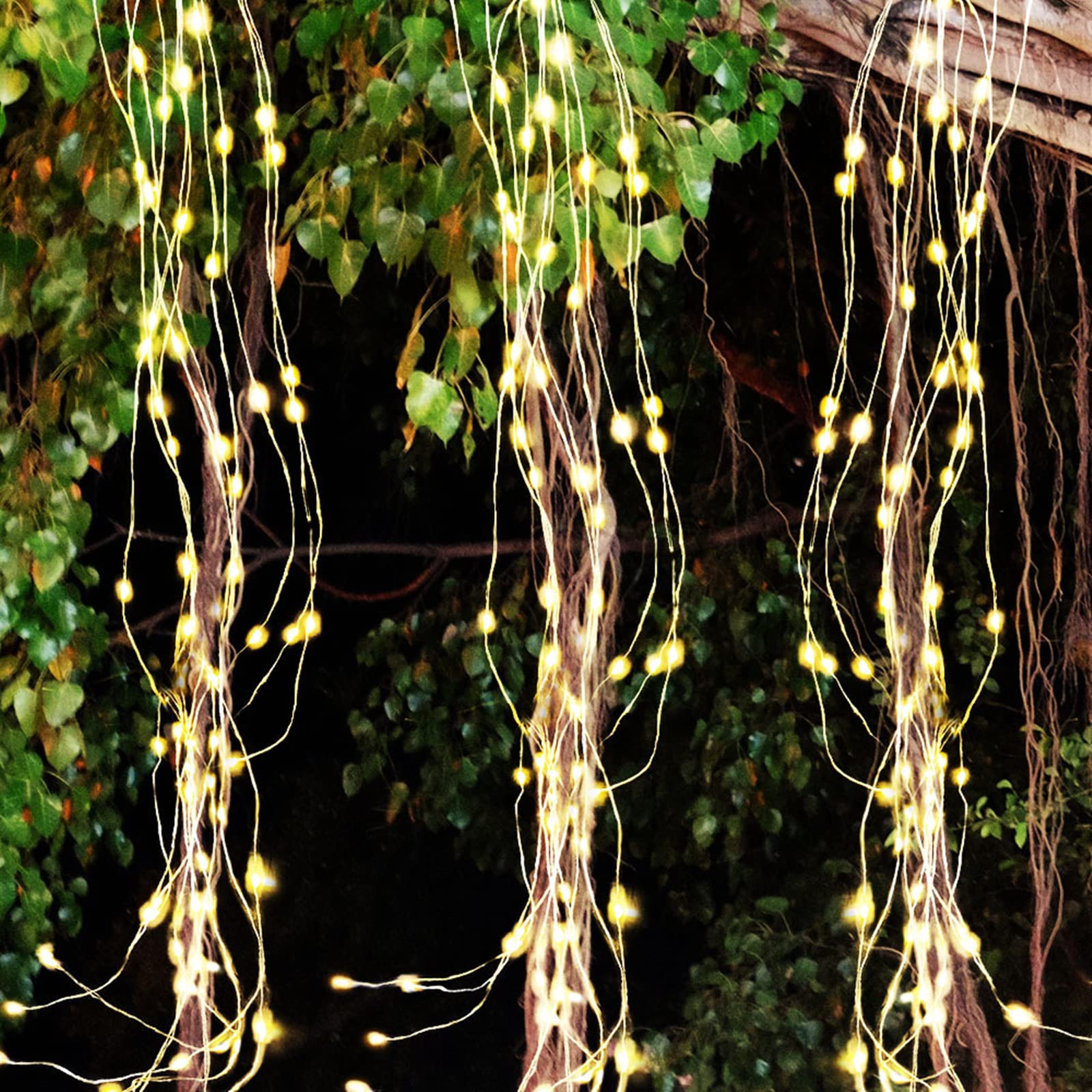Photo 1 of Minsily Fairy String Lights Plug in 7Ft 280leds 14 Strands Hanging LED Firefly Bunch Lights Waterproof Waterfall Light Decorative Fairy Light for Bedroom Party Garden Outdoor Christmas(Warm White)