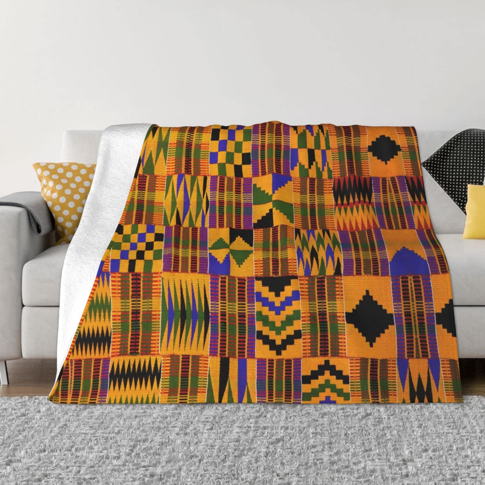 Couverture flanelle motif ethnique africain pour vos soirées cocooning au salon