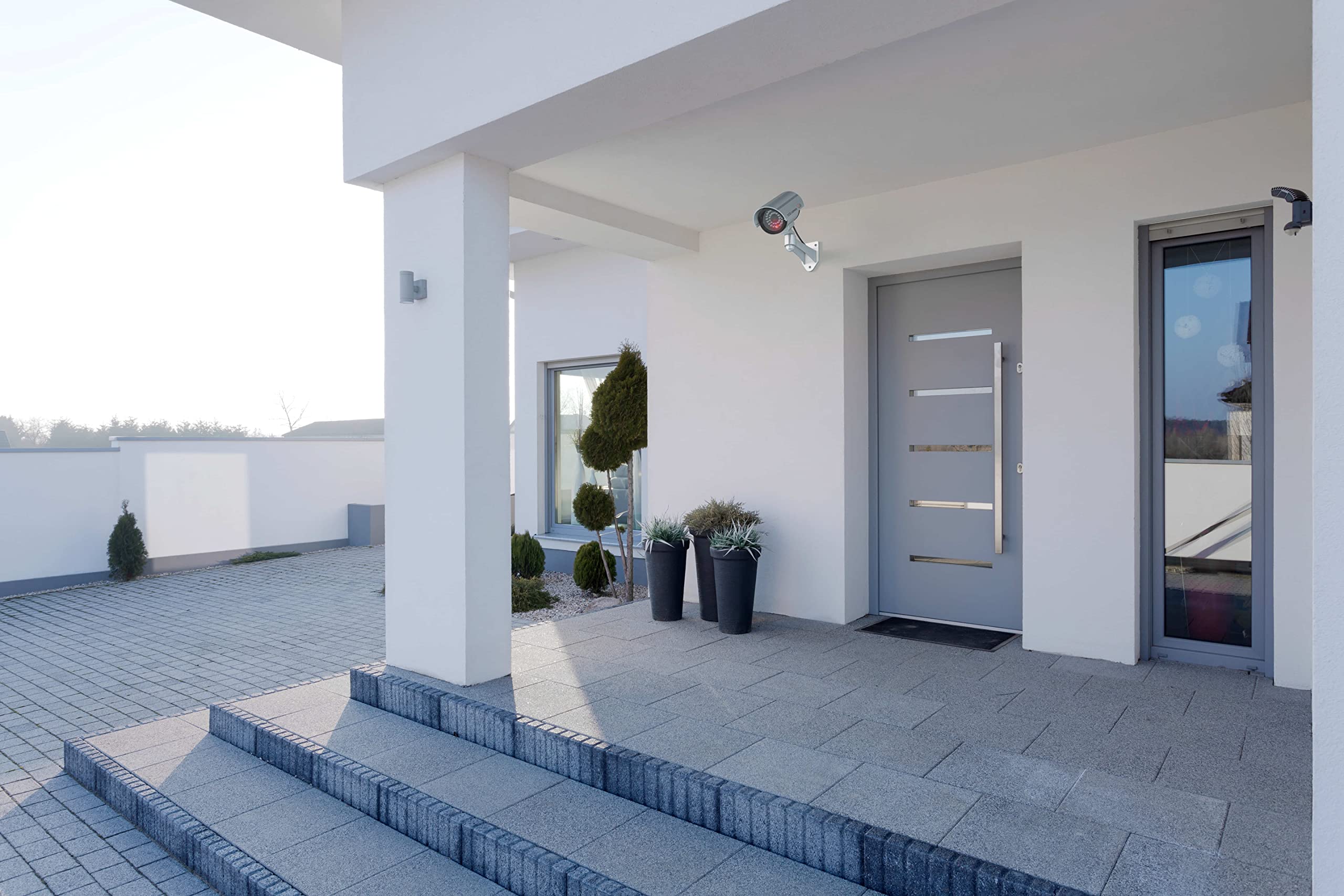 BASI Set di 4 telecamere finte con luce LED lampeggiante | telecamera di sicurezza | telecamera di sorveglianza per interni ed esterni | supporto da parete | senza fili argento | CCTV | 4 pezzi