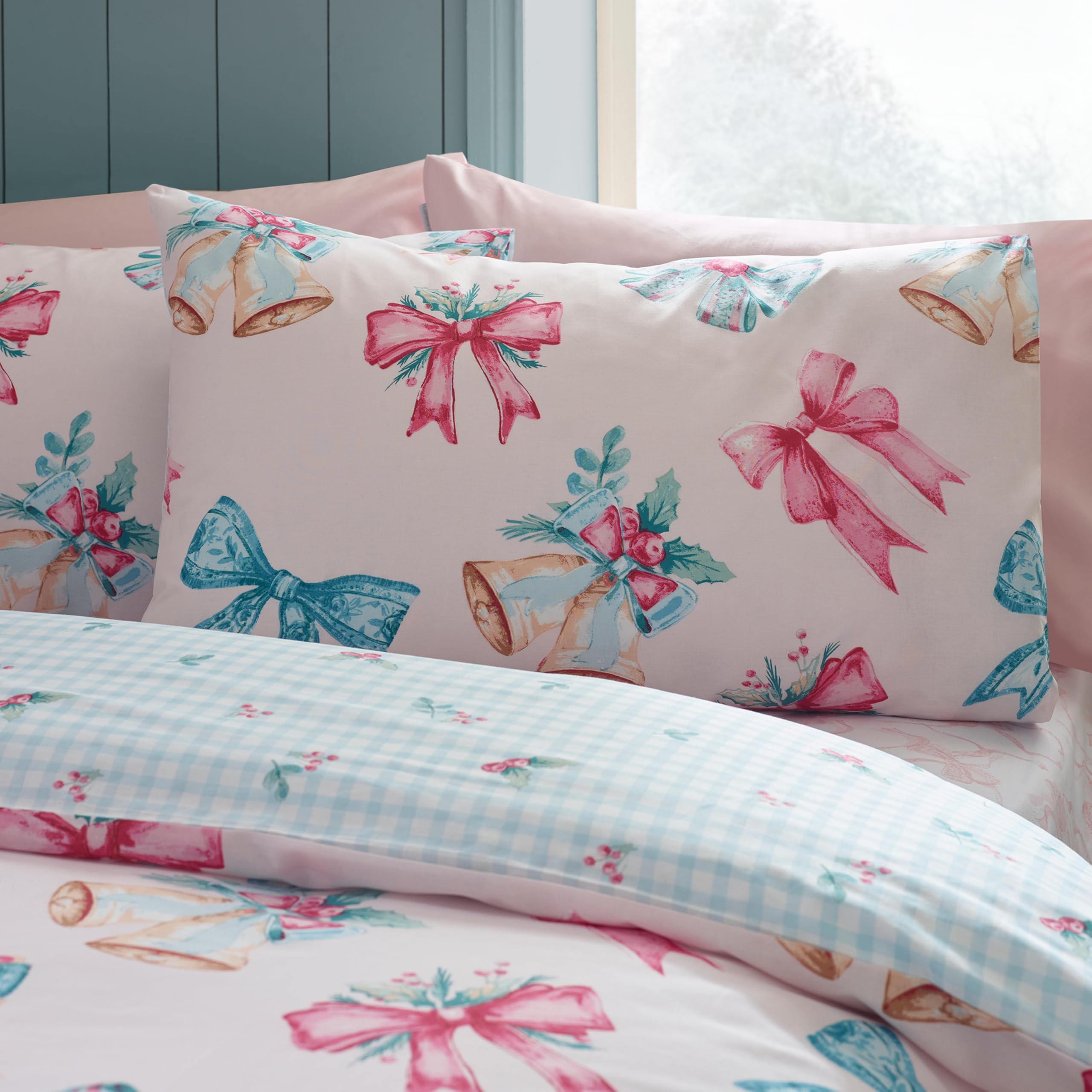 Catherine Lansfield Parure de lit réversible avec taies d'oreiller et nœuds de Noël pour lit King Size Rose