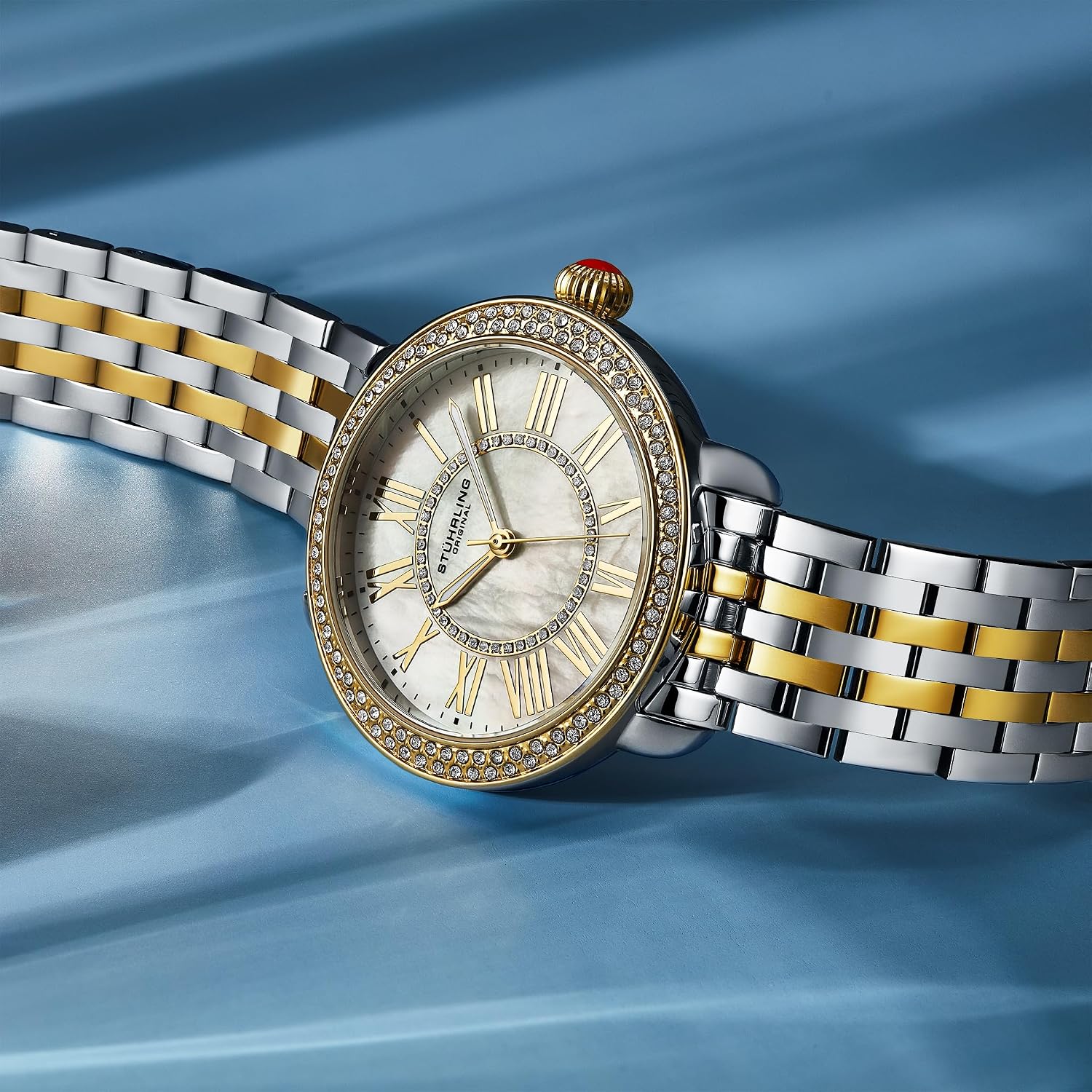 Stuhrling Original Women’s Stainless Steel Watch – Crystal Bezel, Iridescent Mother-of-Pearl Dial, Quartz Movement, Mineral Crystal, Steel Bracelet, 50M Water Resistant, Red Crown