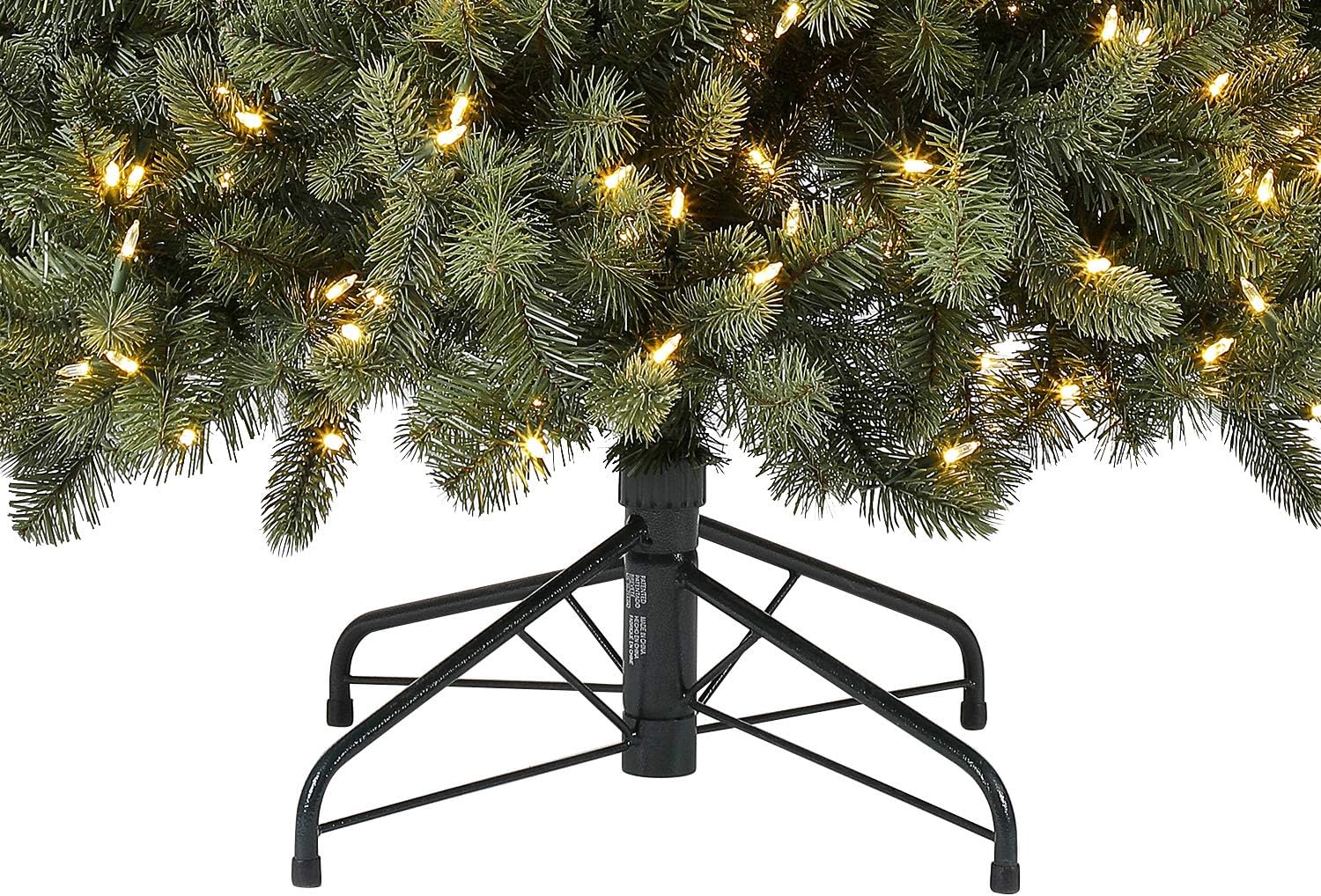 Folding metal tree stand with legs extended and screw tightened.