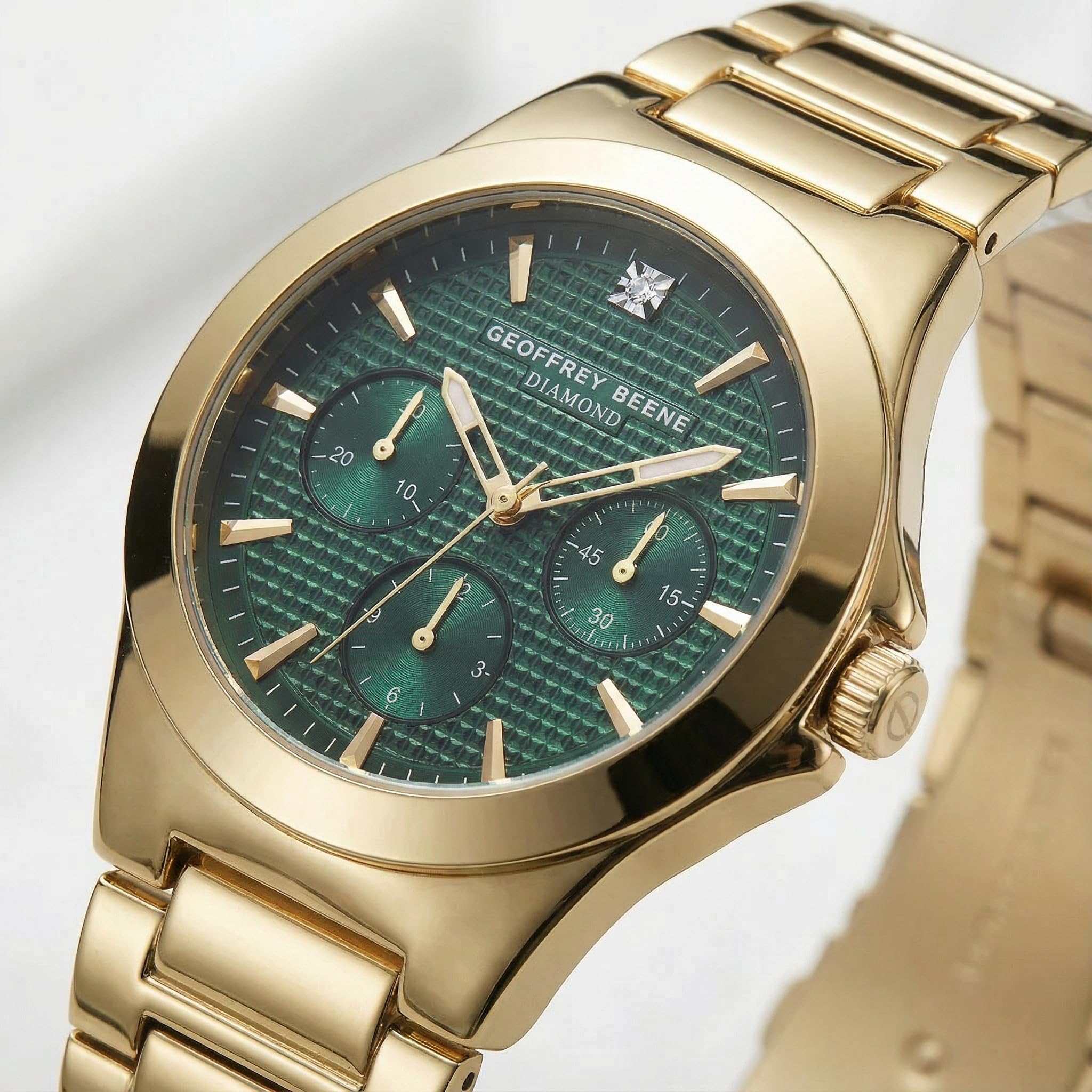 Geoffrey Beene Orologio da uomo in acciaio inox dorato, classico, al quarzo, design elegante, resistente all'acqua