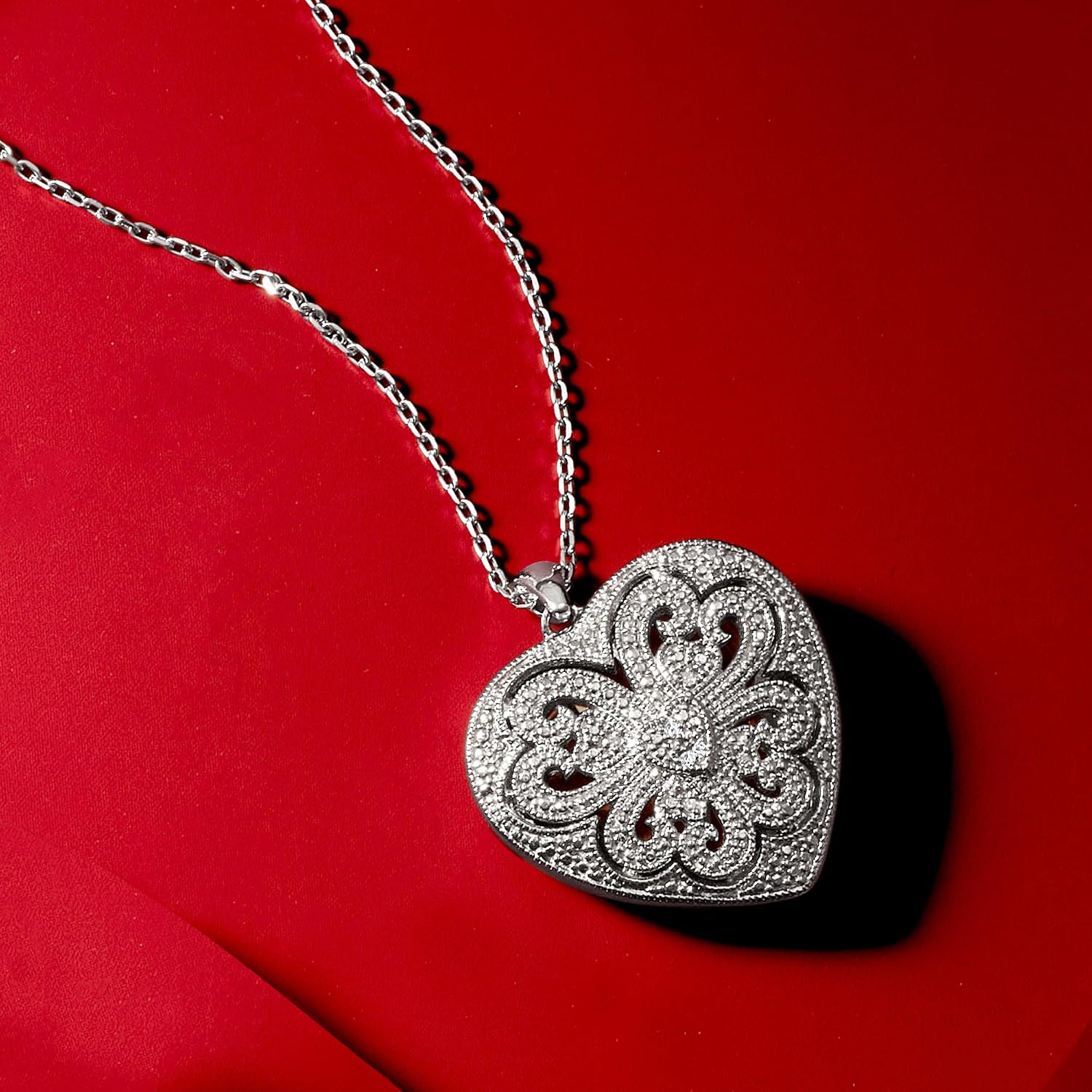 Ross-Simons Sterling Silver Scrolled Heart Locket Necklace With Diamonds. 16 inches