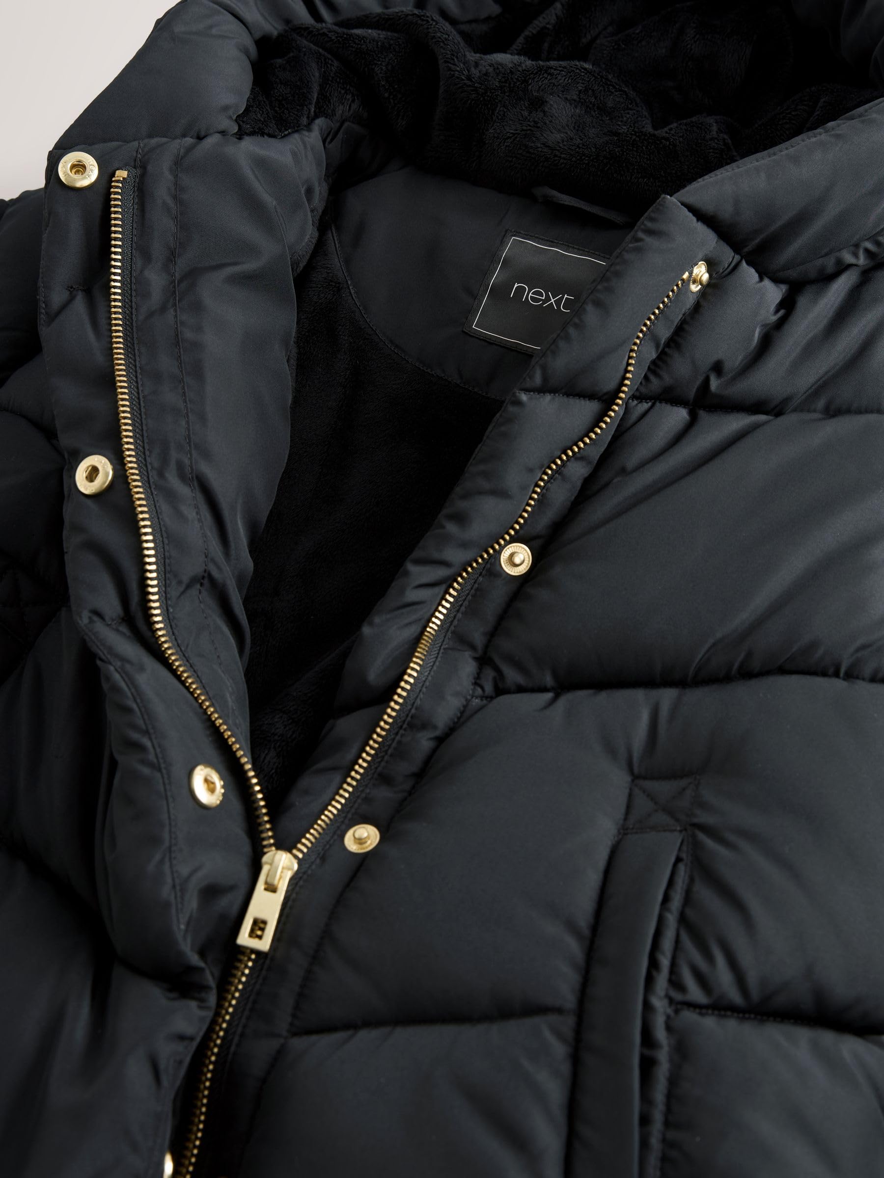 NEXT Niñas Abrigo acolchado con capucha, forro de pelo sintético y diseño impermeable