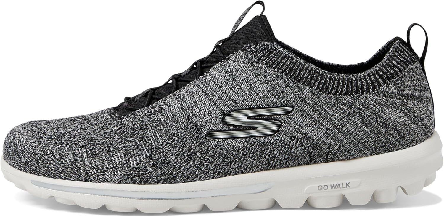 Skechers Women's GO Walk Travel-Radiant Moon Sneaker, Black/White, 8.5