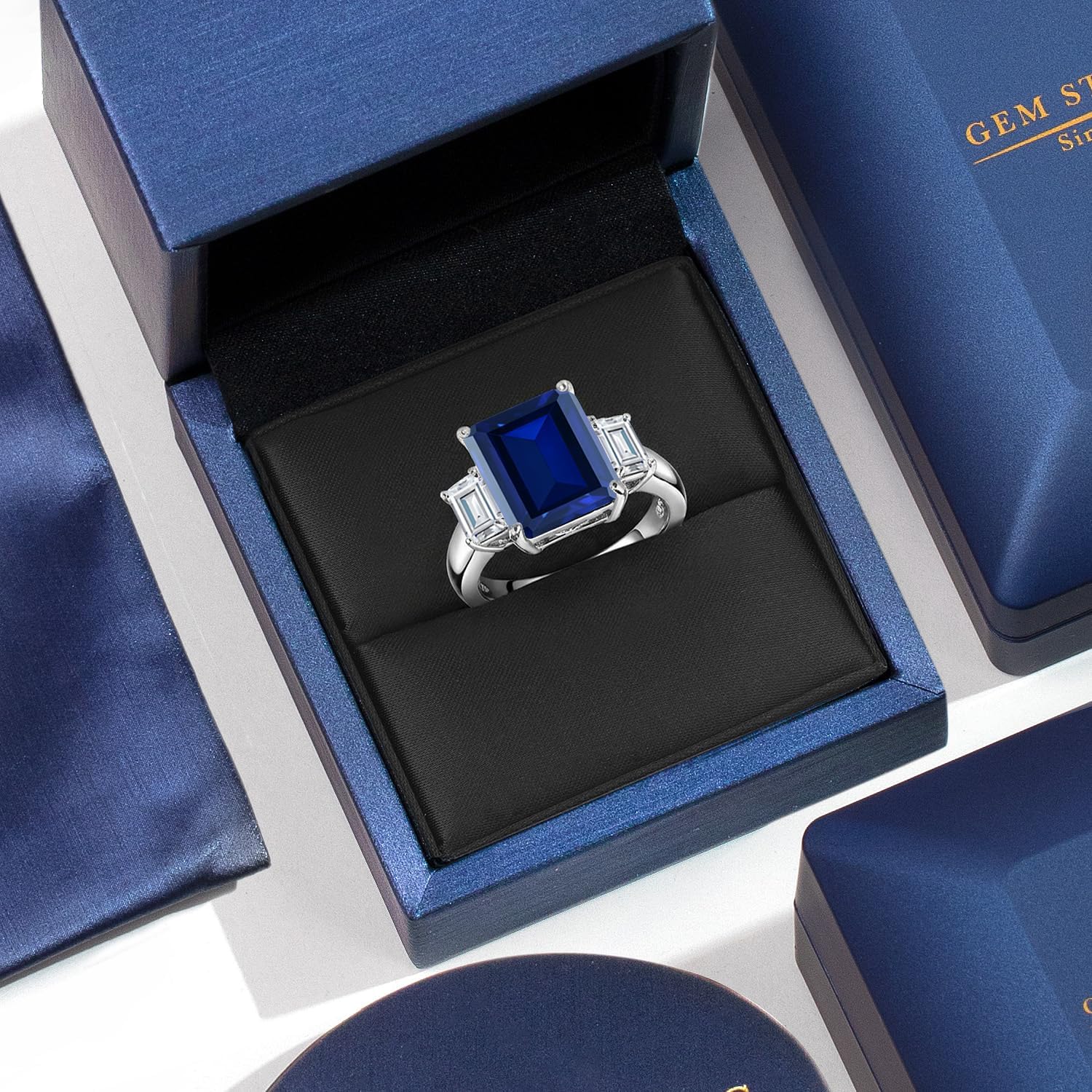 Gem Stone King 7.84 Cttw Blue Simulated Sapphire and White Moissanite 3-Stone Ring For Women | 925 Sterling Silver | 3 Stone Wedding Engagement Anniversary Promise Ring For Women