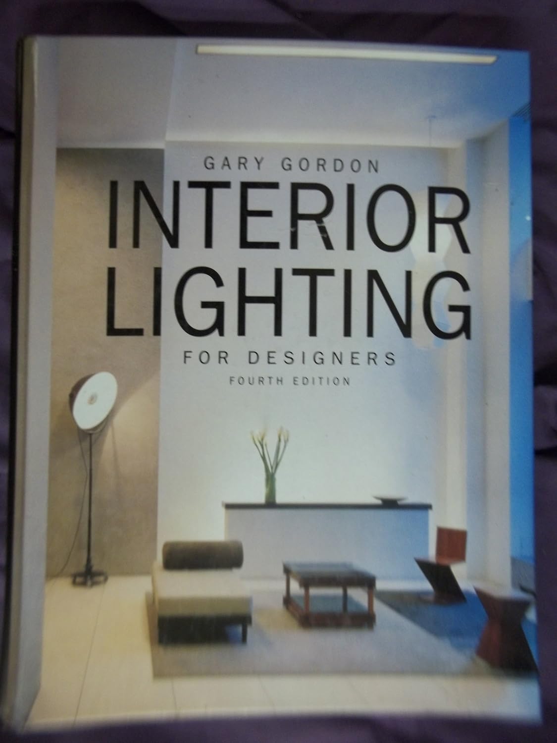 Interior Lighting for Designers      Hardcover – January 1, 2003