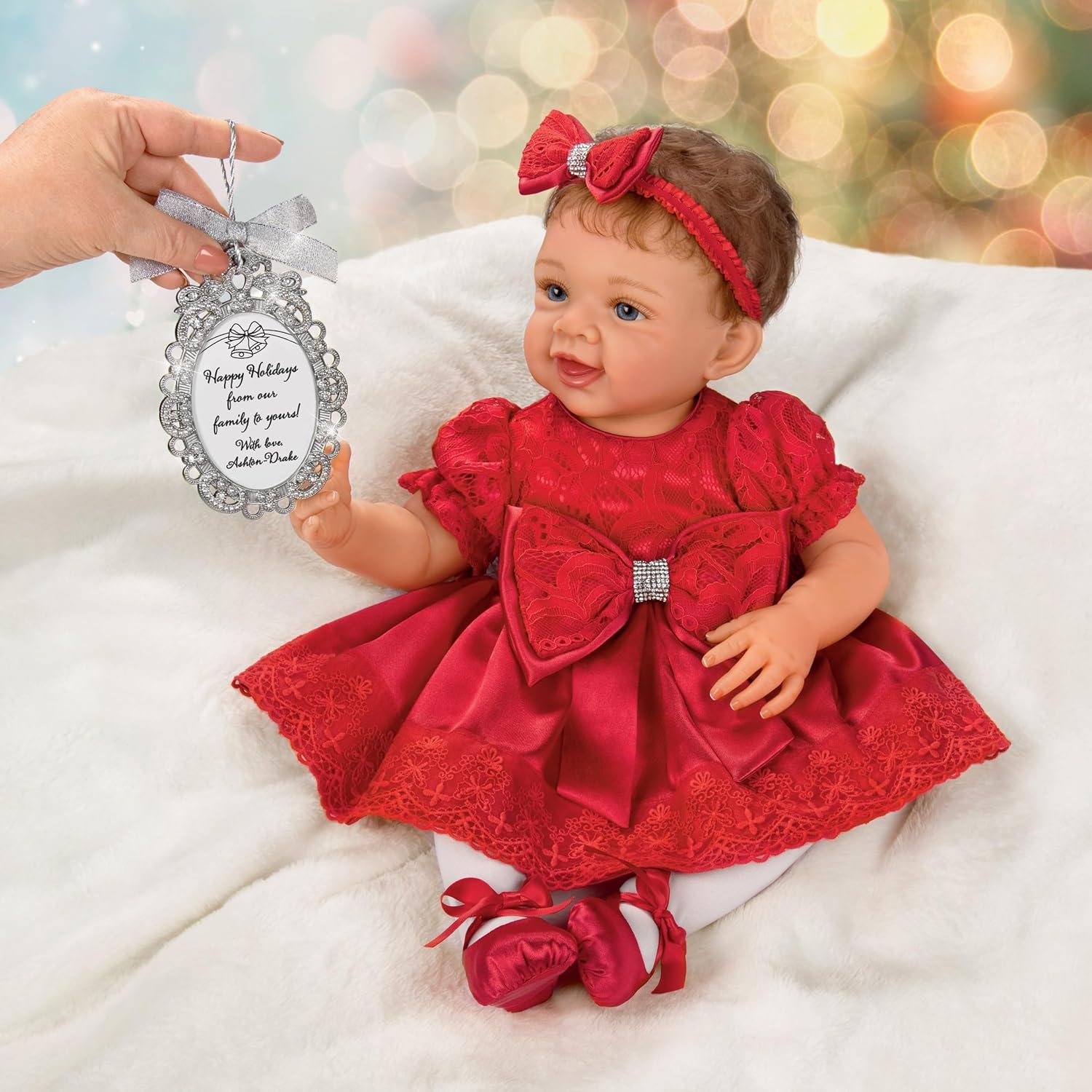 The Ashton-Drake Galleries My First Christmas Gianna Lifelike Baby Doll with Custom Red Satin Outfit and Silver-Toned Ornament