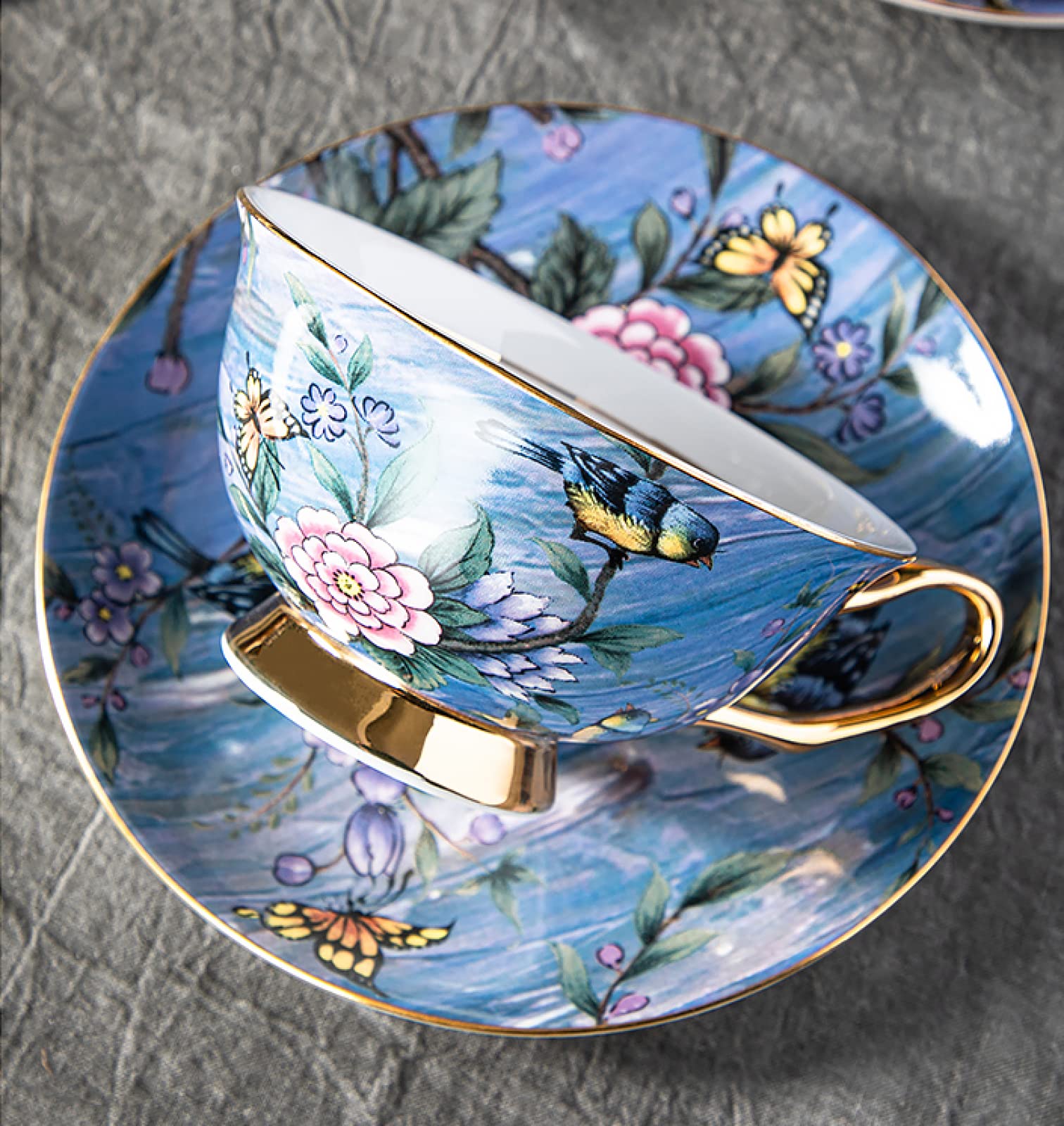 Juego de taza de té y platillo de café de cerámica Juego de taza de café y platillo de cerámica con pájaros y flores azules plato de taza de jugo