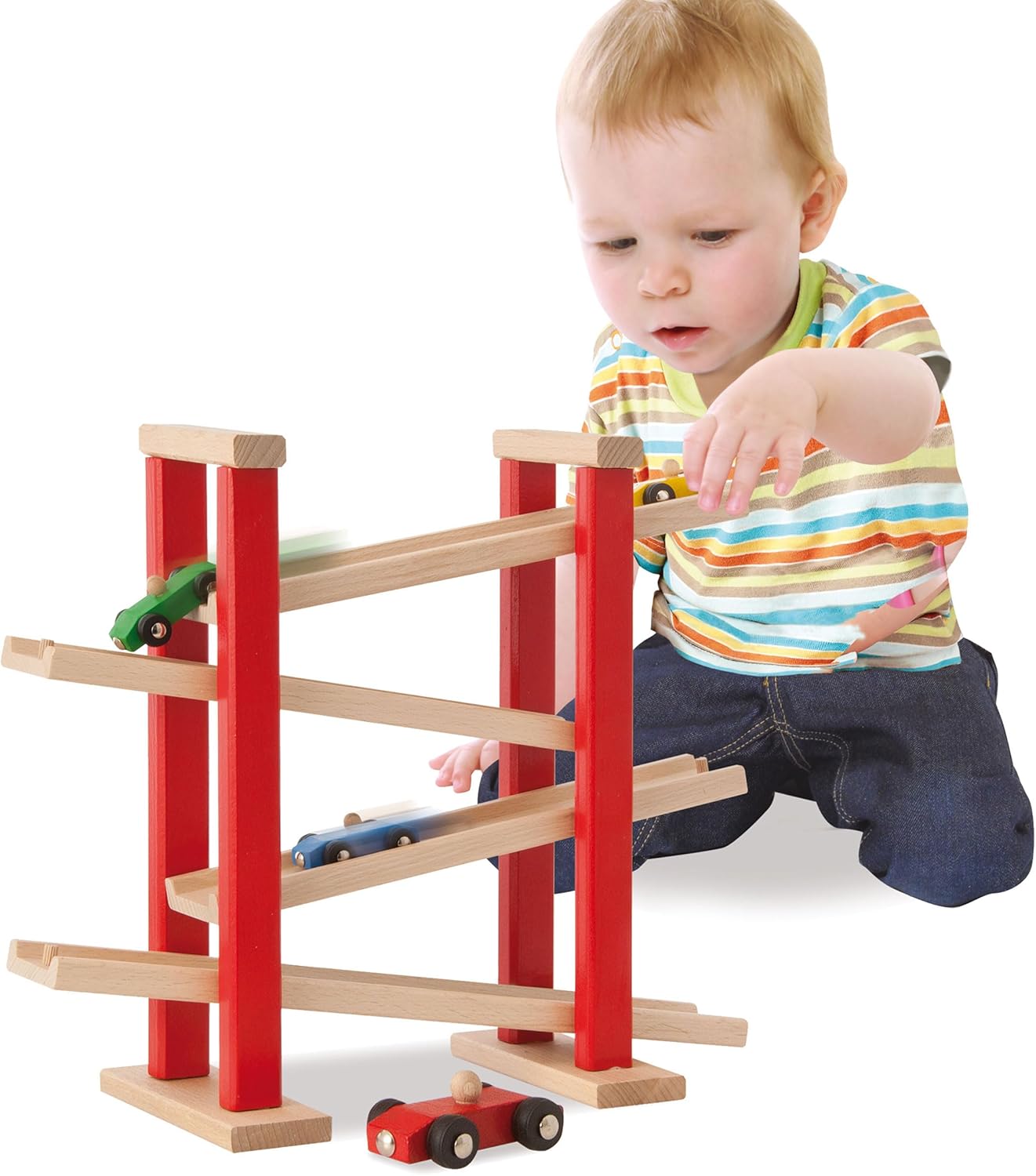 Young child playing with the Eichhorn Car Racing Track
