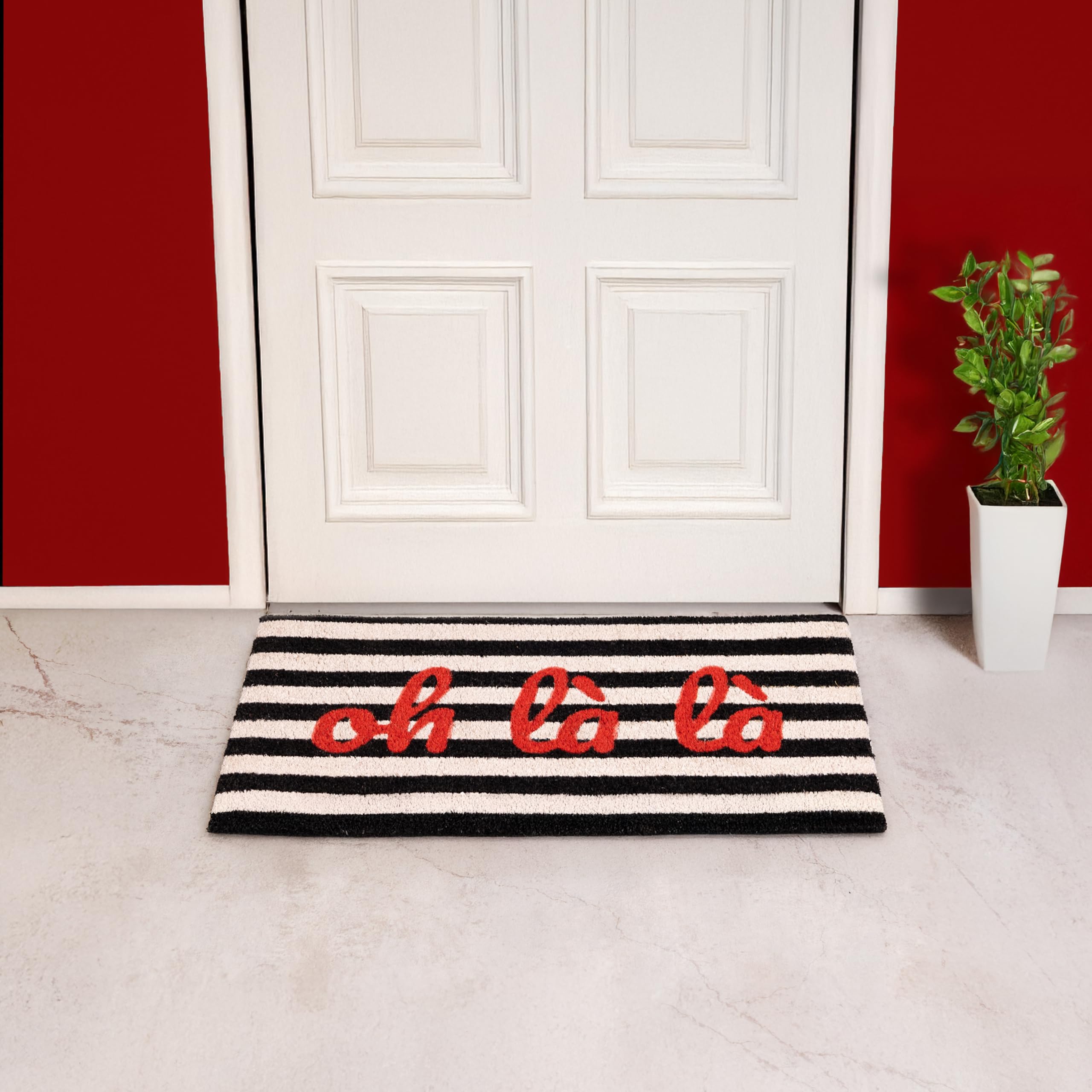 FISURA – Fußmatte Oh là là“ aus Kokosfaser mit Rutschfester PVC-Unterseite. Handbemalte schwarz-weiße Streifenmatte mit französischem Flair. Maße: 70 cm x 40 cm.