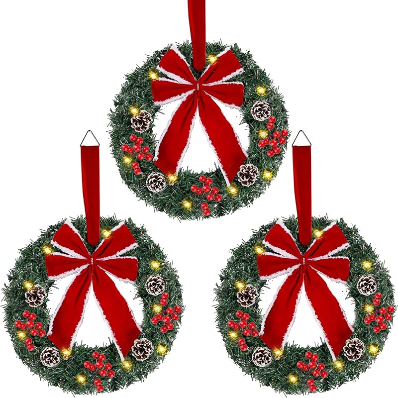Hausse Juego de 3 coronas navideñas, corona navideña artificial iluminada con gran lazo rojo y adornos, funciona con pilas con luces LED, para decoración de fiesta de Navidad en la pared de la puerta delantera