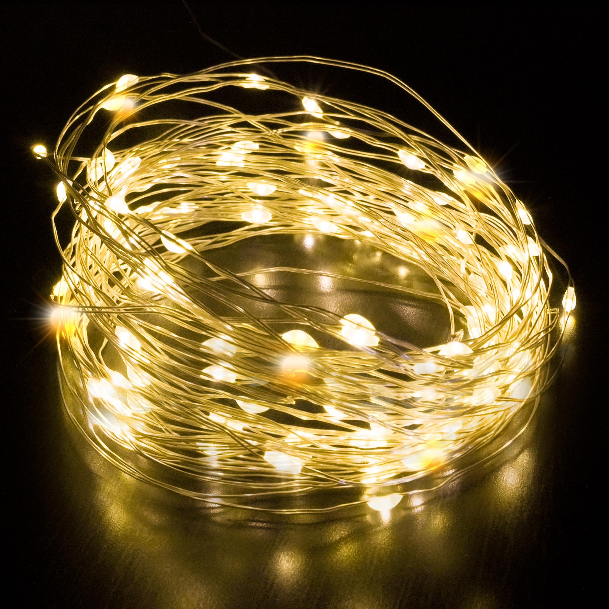 Desiretech - 100 luces LED de hadas alimentadas por pilas - Cadena de luces de alambre de cobre de 10 m - LED decorativo impermeable para uso en interiores y exteriores (caja de batería en interiores)