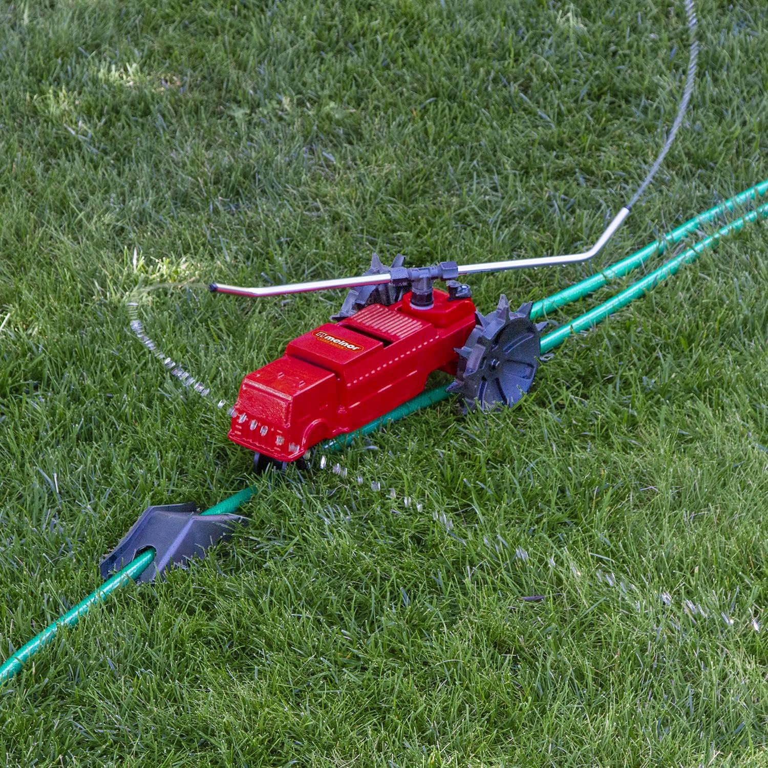 Melnor Traveling Sprinkler on a hose path with a stop ramp