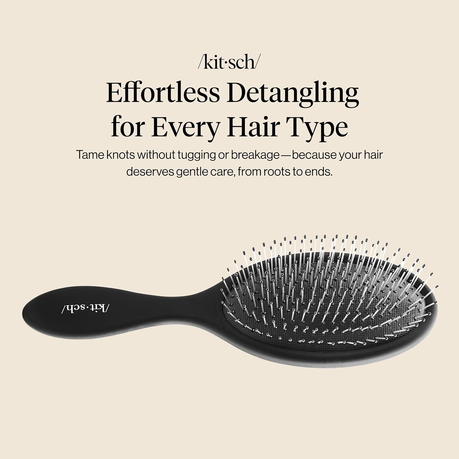 The Kitsch Recycled Plastic Wet/Dry Hair Brush in black, showcasing its flexible bristles and ergonomic handle.