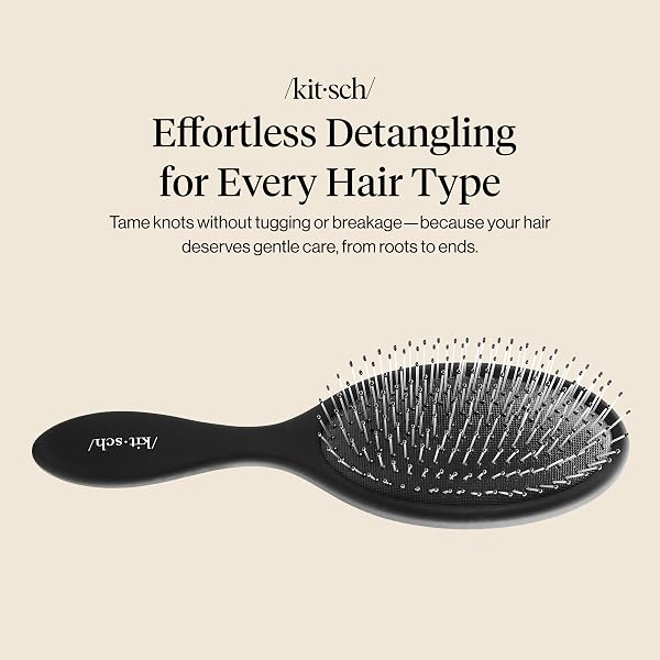 The Kitsch Recycled Plastic Wet/Dry Hair Brush in black, showcasing its flexible bristles and ergonomic handle.