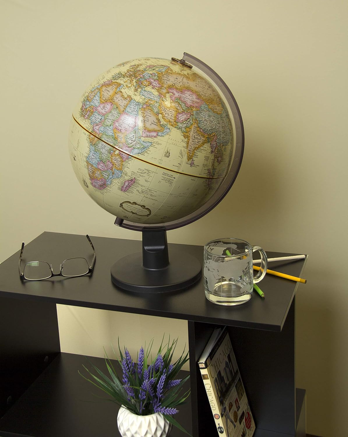 Spotter 12" Diameter Globe, USA Cartography with with Mountain Relief, Durable Black Base and Antique Globe Ball. This beautiful 12” Antique Globe ball with unique Replogle map by Globe Master. This high quality, durable press craft globe is packed with premium features such as brightly colored countries and continents, raised-relief and explorer routes (with illustration), and thousands of place names. Perfect for kid’s bedroom, home décor accessory, gift or to use as an education piece for hours of discussion.
