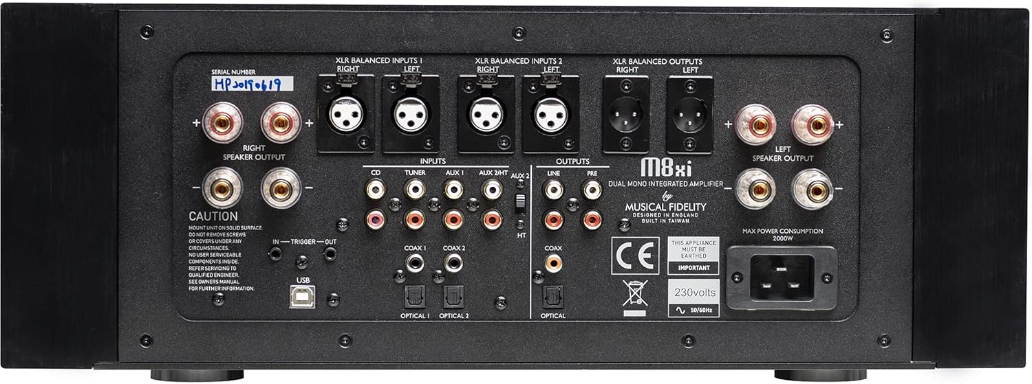 Rear view of the Musical Fidelity M8xi integrated amplifier, showing various input and output connections including XLR, RCA, Coaxial, Optical, and USB.
