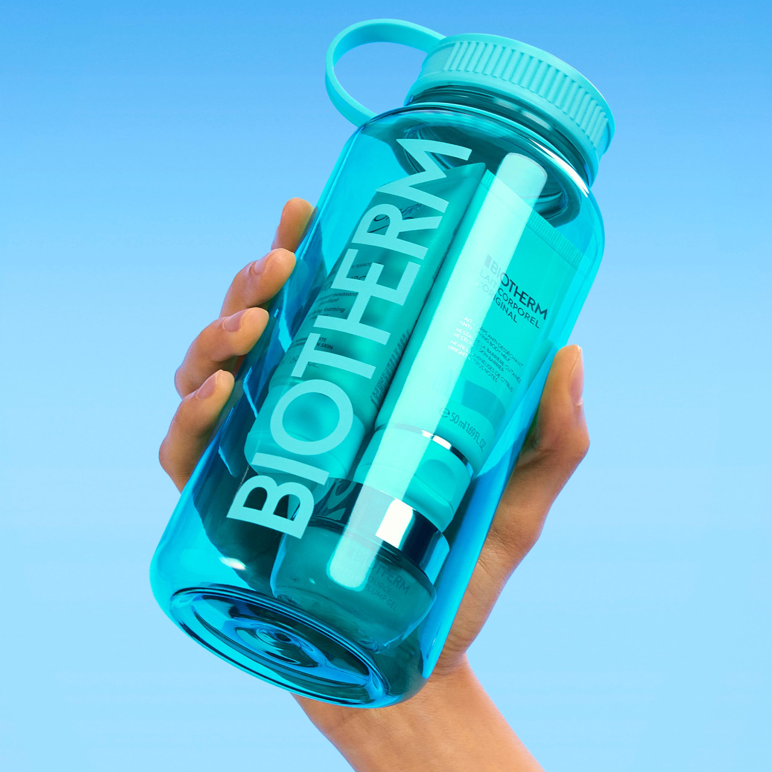 Biotherm, Aqua Drop, Prodotti Essenziali per l'Idratazione di Viso e Corpo | Quattro prodotti per la cura del viso e del corpo, per pelli da normali a grasse, in una borraccia in plastica da 1 litro